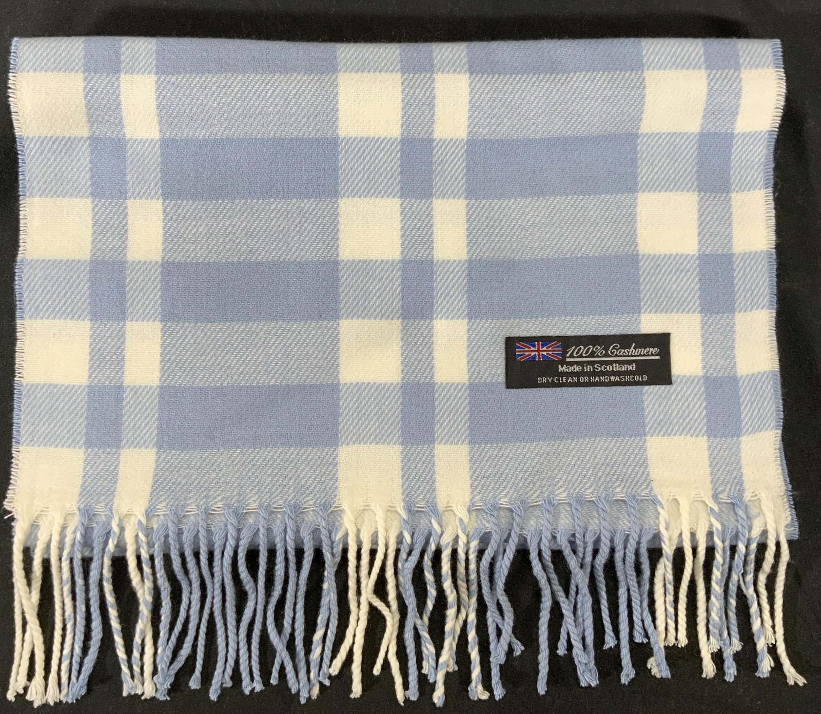 Blue Plaid Cashmere Fringe Trim Scarf, Scotland: Blue plaid cashmere scarf with fringe trim. 100% cashmere. Made in Scotland. Measures approx. 67 inches long. In good condition. Ladies cashmere scarf, ladies blue scarf, ladies plaid scarf, ladies ac