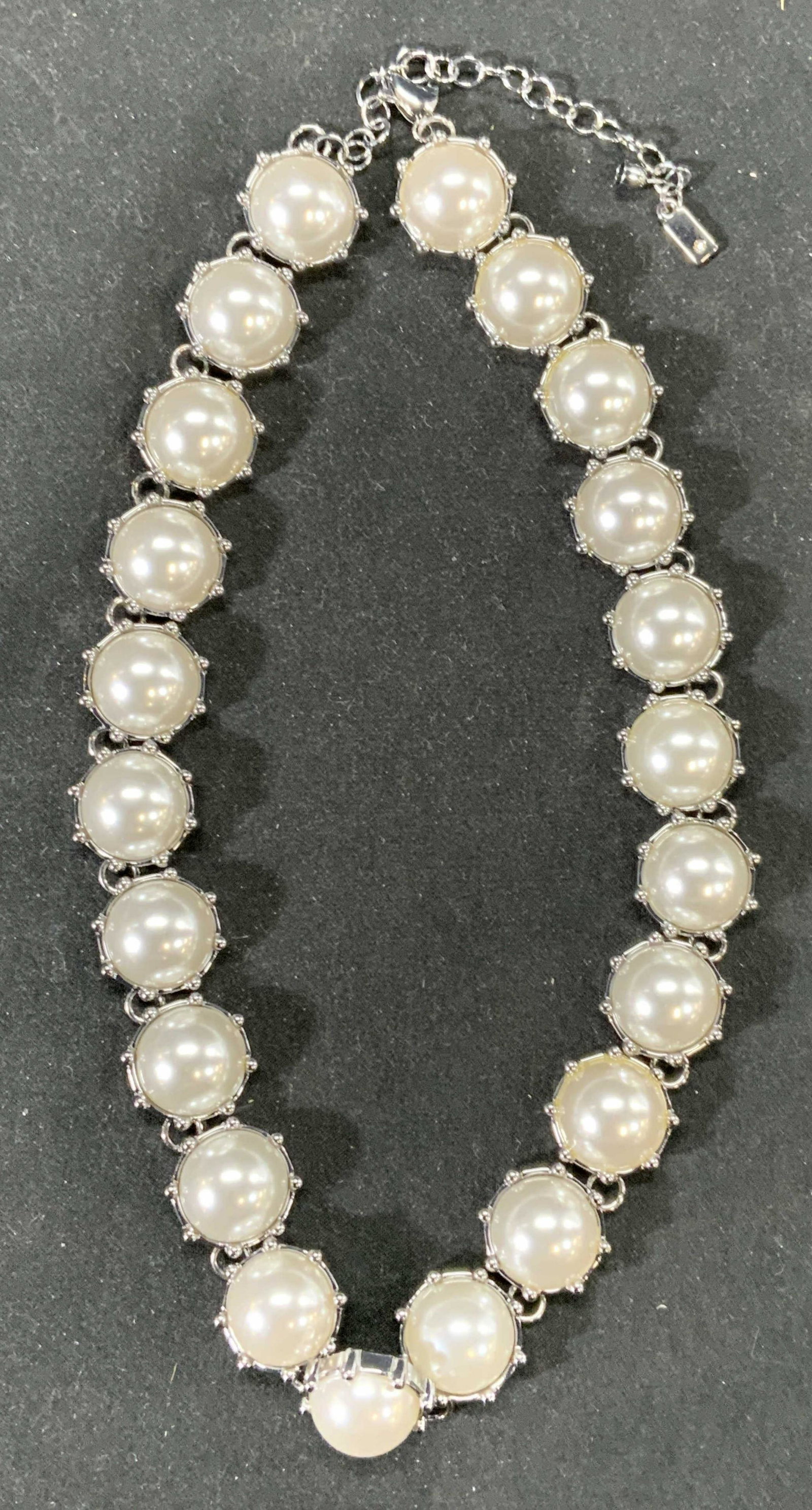 Silver Tone Pearlescent Beaded Choker Necklace: A silver tone choker necklace with prong set pearlescent beads. Lobster claw clasp. Measures approx. 19 inches long. In good condition. Costume jewelry, estate jewelry, cocktail jewelry, fashion jewel
