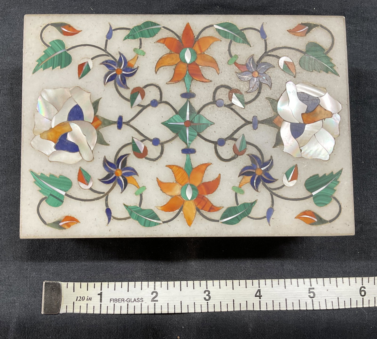 Inlaid Box W Natural Stone, Carnelian & More: Inlaid Trinket Box W Carnelian, Lapis & Mother of Pearl. Measures approx 3.5 x 5 inches. Floral detail with natural stone. Tested positive for natural stone, some surface wear consistent with age. Sli