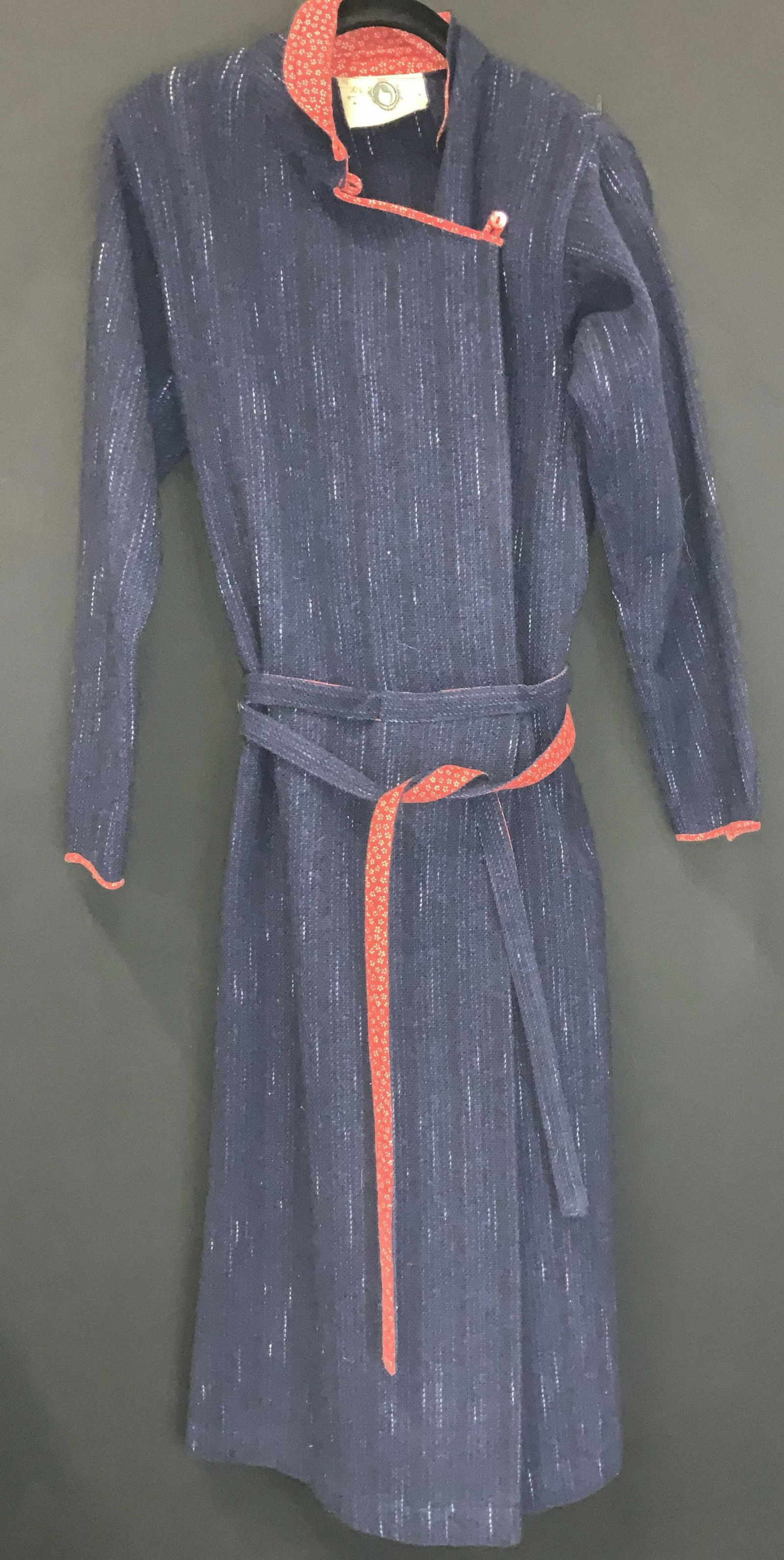 KENZO JAP Wool Dress France: Navy blue wool with red floral cotton trim. c. Mid century and labeled KENZO JAP made in France. attached Waist belt. This dress has a look of a Japanese robe. Vintage size 40. Has hand pockets. 46.5