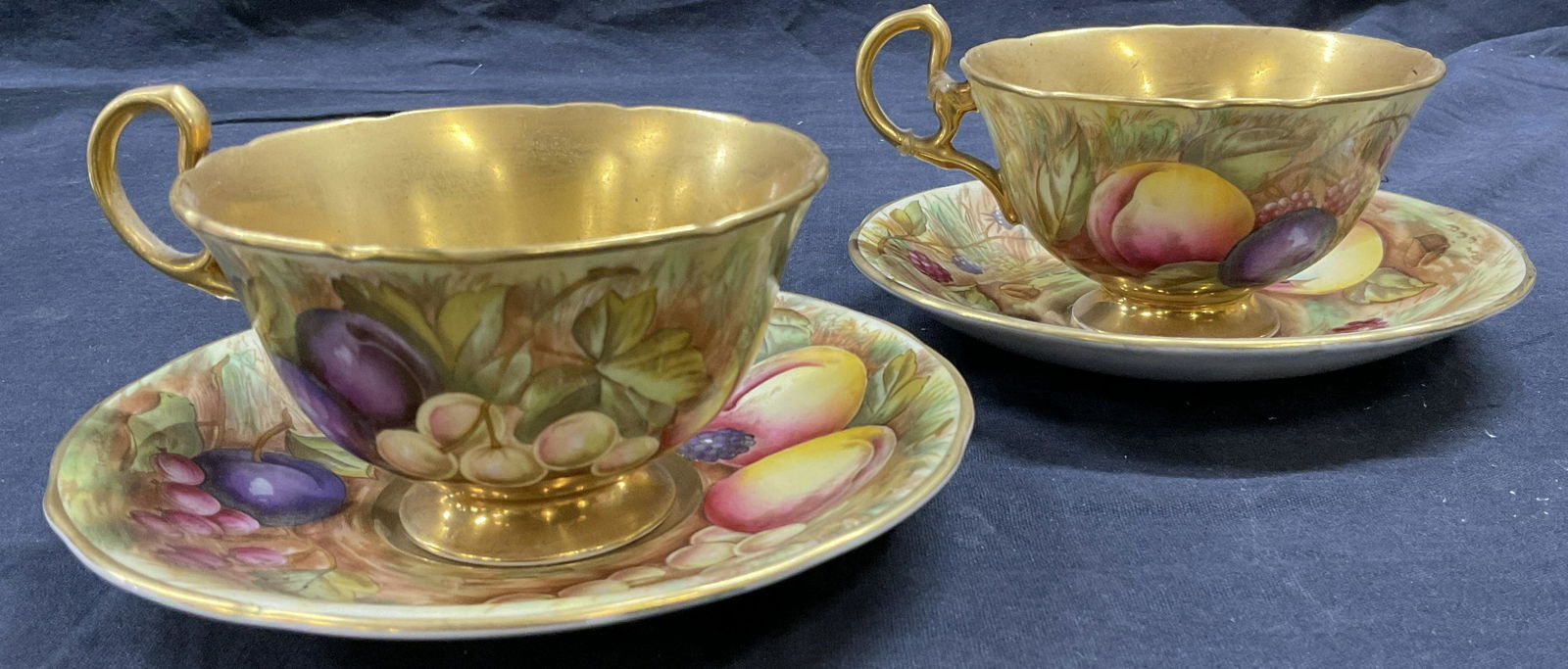 AYNSLEY Bone China Pair Tea Cups & Saucers ENGLAND: AYNSLEY Bone China Pair Tea Cups & Saucers. Gilt detail to interior of cup and saucers. Prior repair to pieces. Handle broken has glue residue to handle. Labeled on bottom AYNSLEY England Bone China,
