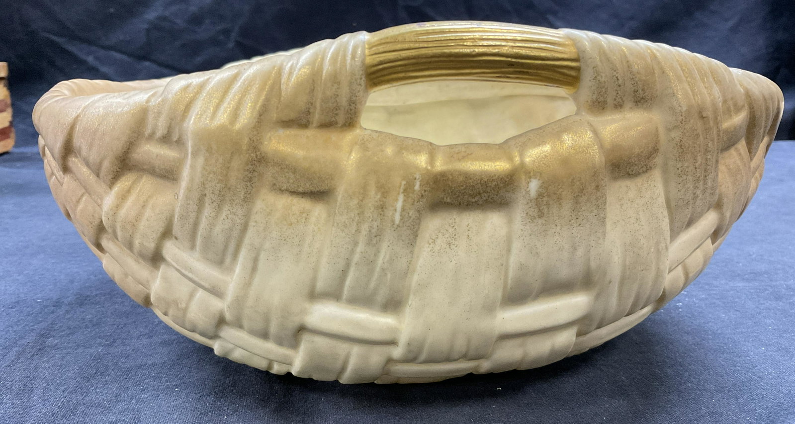 Porcelain Handwoven Style Worcester, ENG: Labeled on bottom partially illegible. Reads partially Worcester England. Detail to inner basket is floral and some gilt detail is present to piece, partially wearing away. Measures approx 8.75 x 7.5 