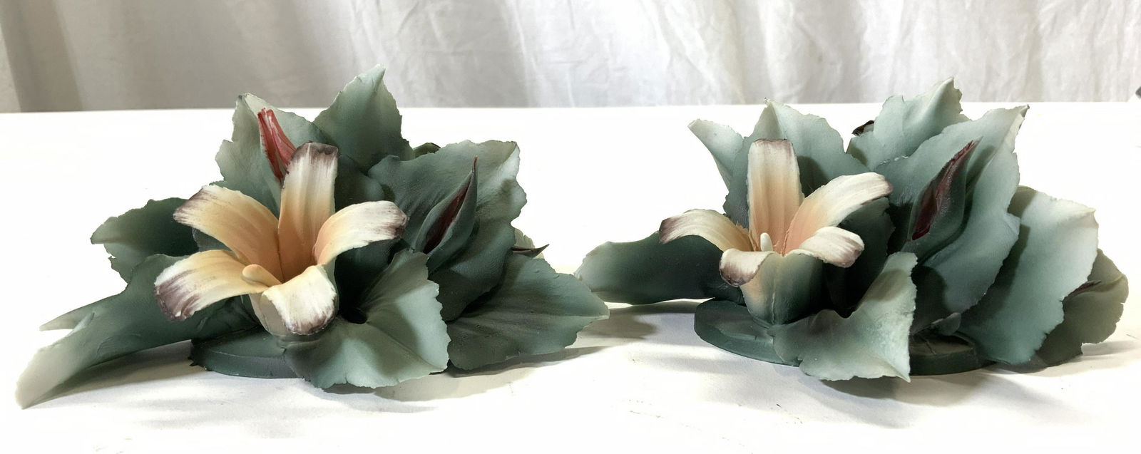 NIPPON Porcelain Floral Figures: Undersides are marked N with crown. Piece is peach white and green toned. Each piece has floral & leaf detail. Each measures approx 5.5 inches long 4 inches deep 2.5 inches tall. Nippon porcelain, Nip