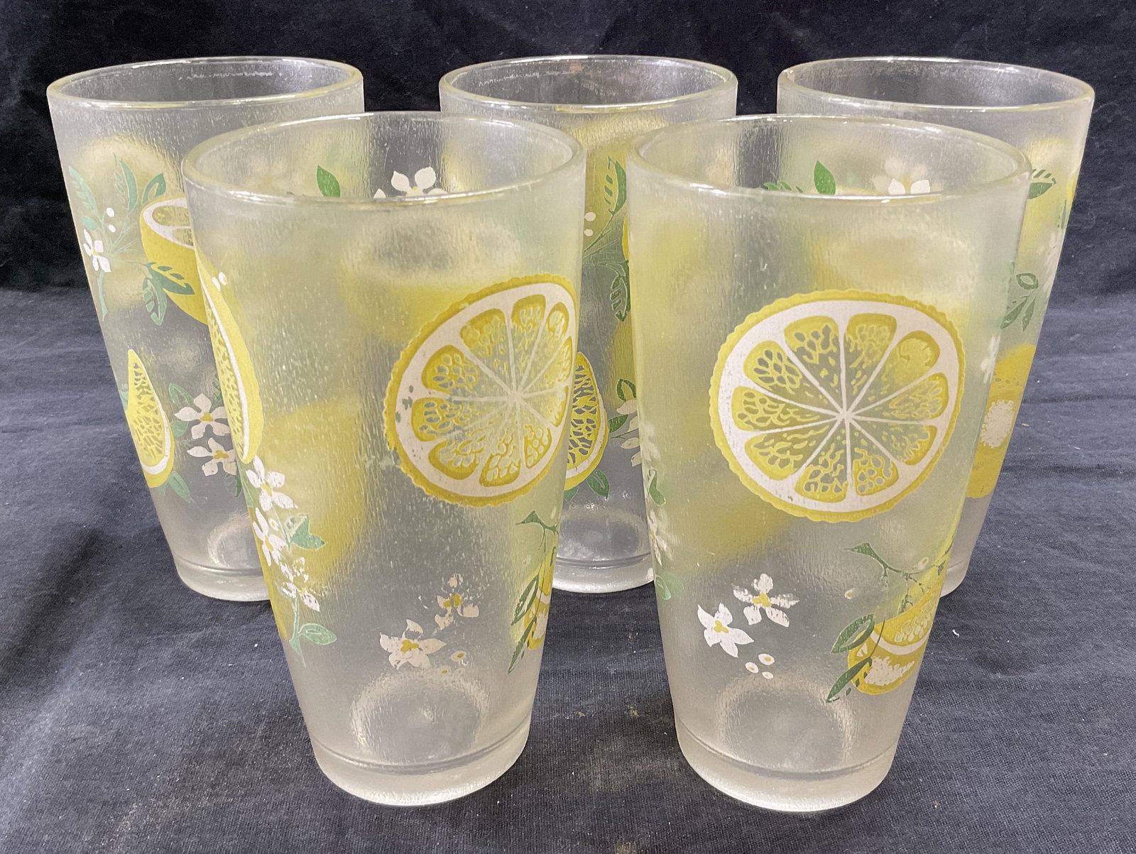 HJ STOTTER INC Set5 Lemon Motif Cups, Barware: 5 composite drinking cups with lemon motifs on the exterior of the cups. Approximately 5.75 inches tall. Marked on undersides HJ Sotter Inc, NY, USA. HJ stotter inc cups, drinking cups, lemon motifs, 