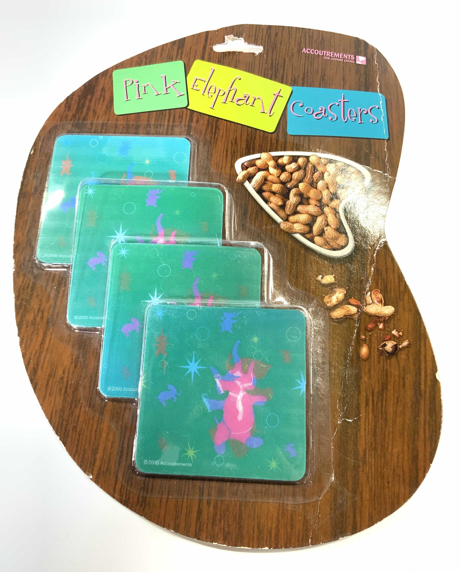 ACCOUTREMENTS Holographic Elephant Coasters NiP: Packaging reads PINK ELEPHANT COASTERS. Coasters read copyright 2000 Accoutrements. Coasters appear to be holographic. Packaging measures approx 12.5 inches tall 10 inches wide. Coasters, elephant coa