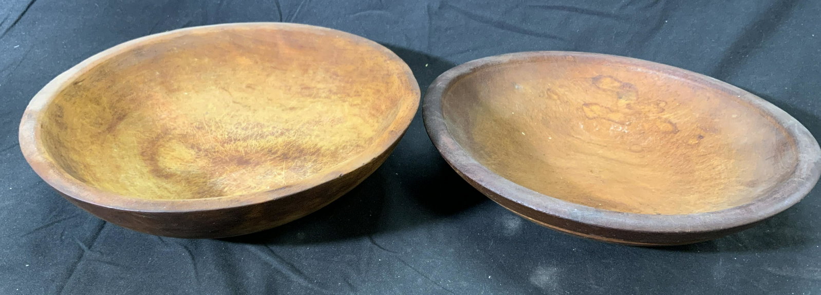 Pair Vintage Wood Salad Bowls: Pair of vintage wood salad bowls. Surface wear consistent with exposure. Smaller approx. 11 inches diameter, larger approx. 11.25 inches diameter. Bowls, wood bowl, salad bowl, tableware, kitchenware,