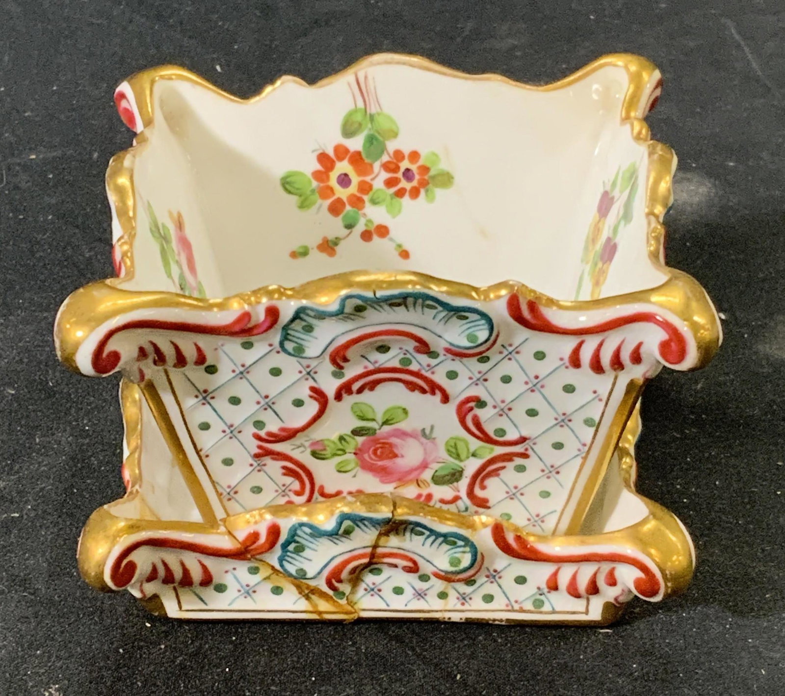 Vintage MINTONS Porcelain Vessel & Under Plate: Vintage MINTONS porcelain vessel and under plate with gilt decoration and floral motif. Vessel measures approx. 3 x 2.5 x 2 inches, under plate measures approx. 3 x 3 inches. Both pieces trademarked t