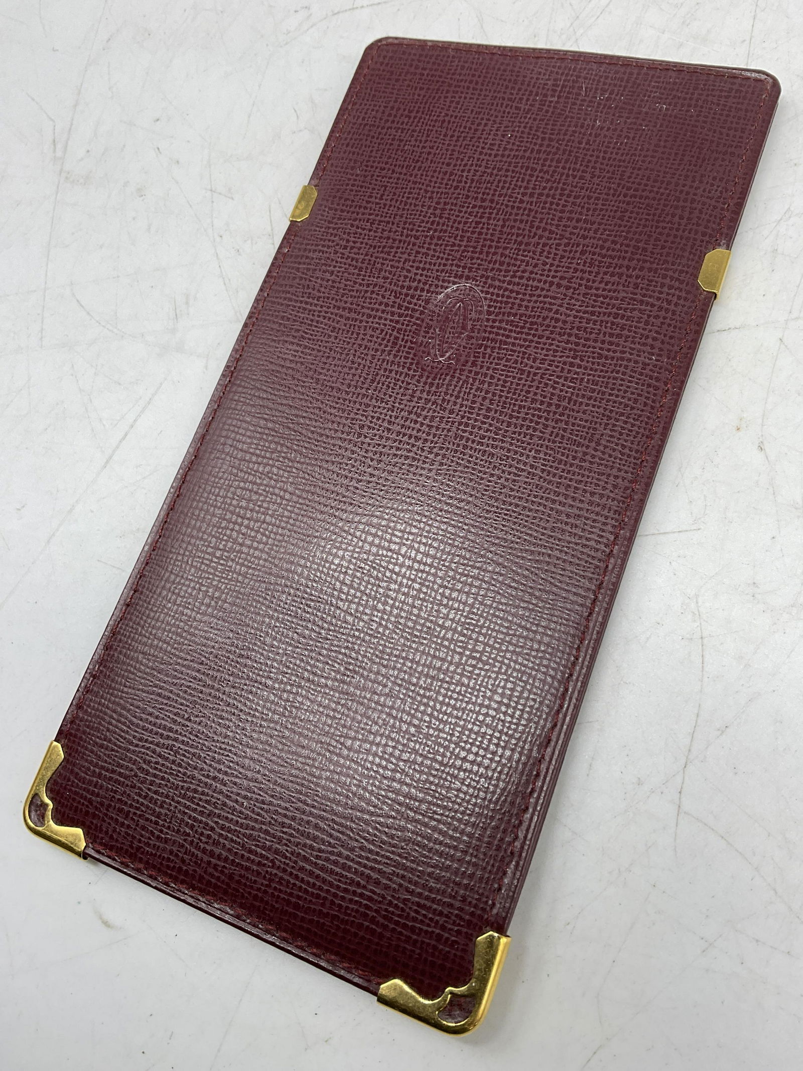 Cartier Vintage Glasses Case: Cartier Vintage Glasses Case. Measures approx 3 x 6.25 inches surface wear to piece consistent with age and use. Some markings to exterior. Needs cleaning. Cartier Mark to front. Cartier glasses case,
