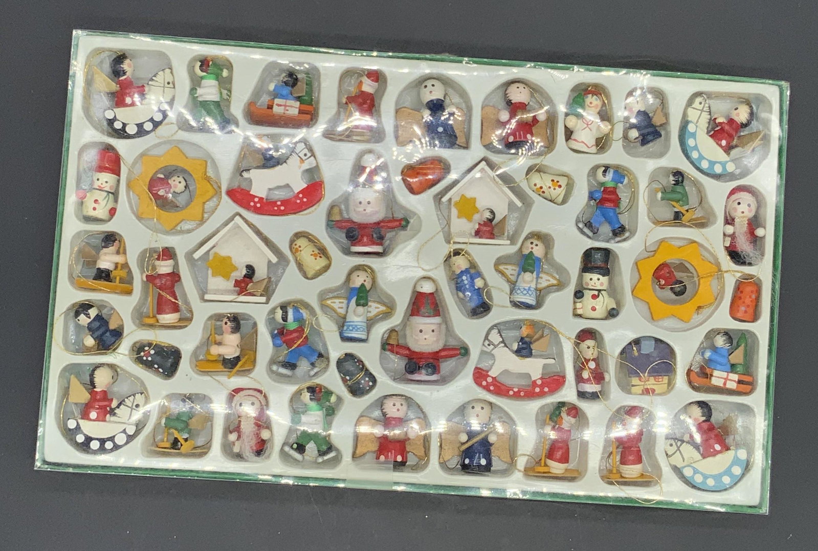 Vintage Holiday Ornaments & Decor, NIP & More: Group lot. Some new in package vintage holiday / Christmas ornaments and decor. Some pieces out of package / opened package. Ball ornaments, wood ornaments, and more. Items from Bloomingdales & Dansk.