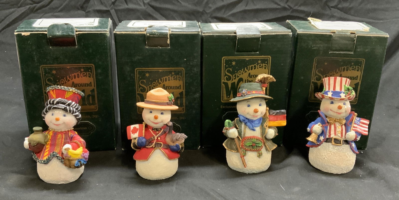 Set 4 Snowmen Around The World Figurines (1 of 4)