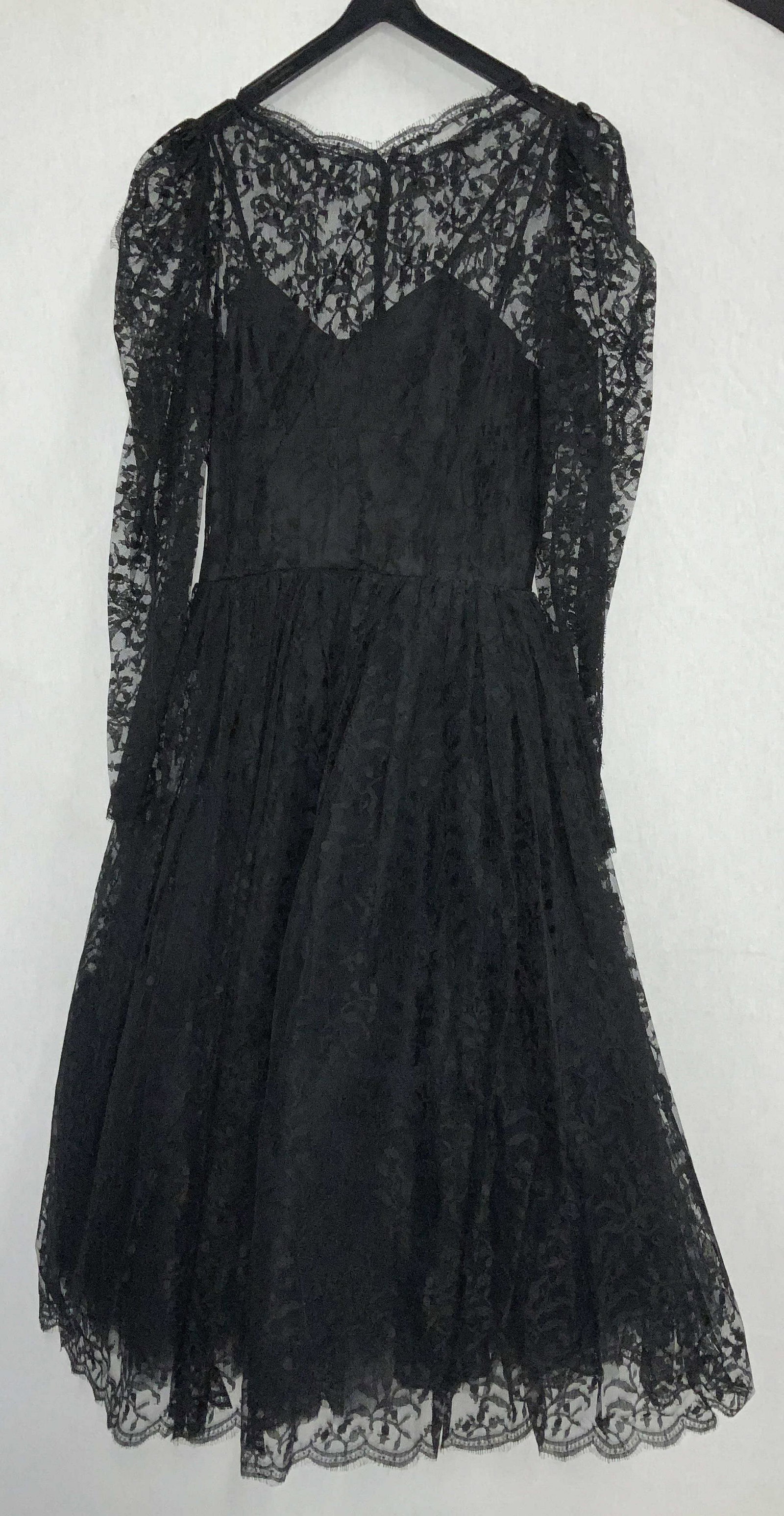 Victor Edelstein Black Lace W Silk Dress, England: Vintage dress with black silk under layer and lace over layer. ( lace polyester and viscose) . Labeled designer attached reads Victor Edelstein LONDON with additional label Corrine Travis for Rose Las