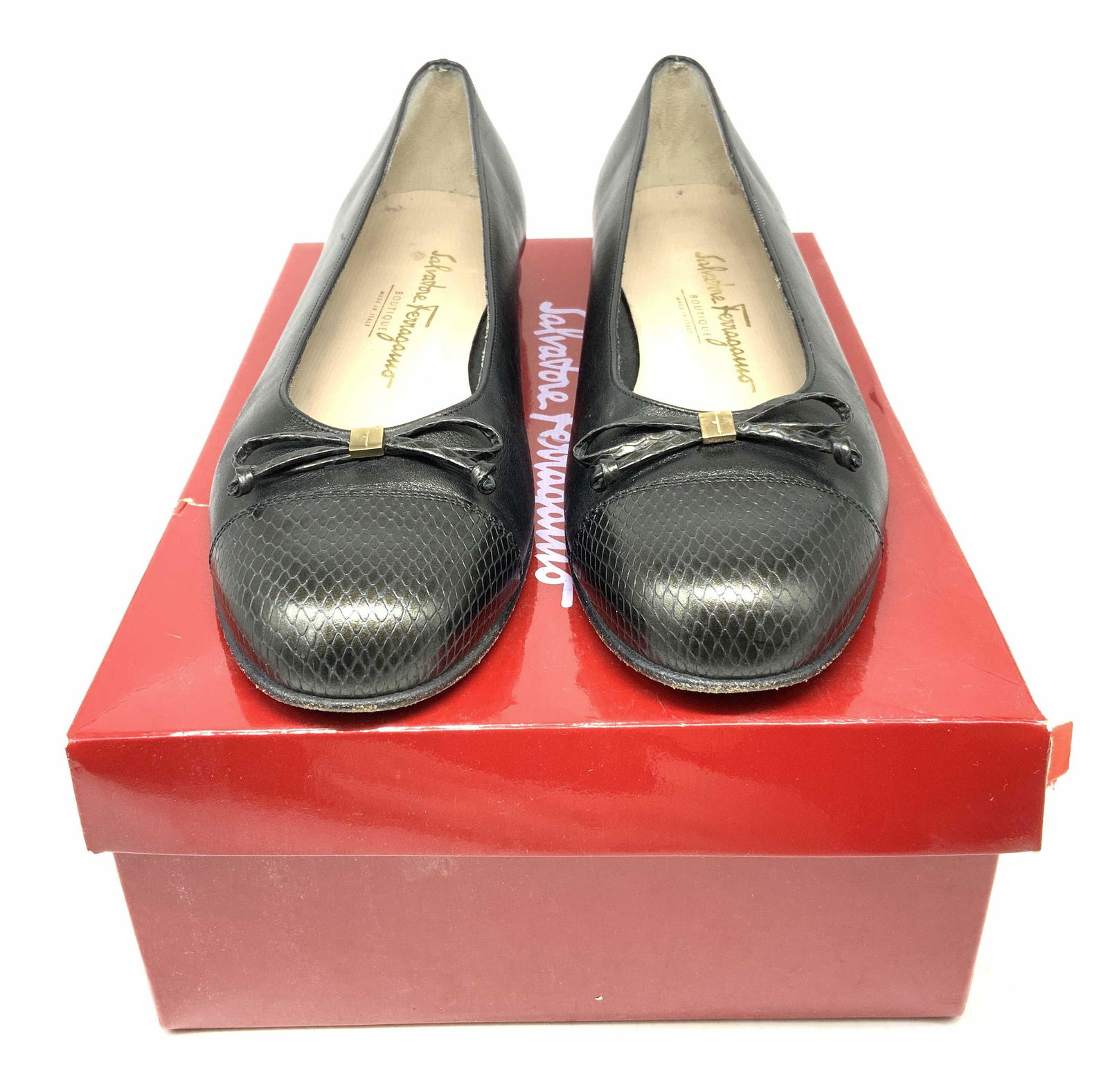 SALVATORE FERRAGAMO Black Leather Ballet Flats: Salvatore FERRAGAMO black leather ballet flats with snakeskin detail to toes. Size 9. Surface wear to soles consistent with use. Made in Italy. Includes box. Salvatore FERRAGAMO Foote wear, Salvatore