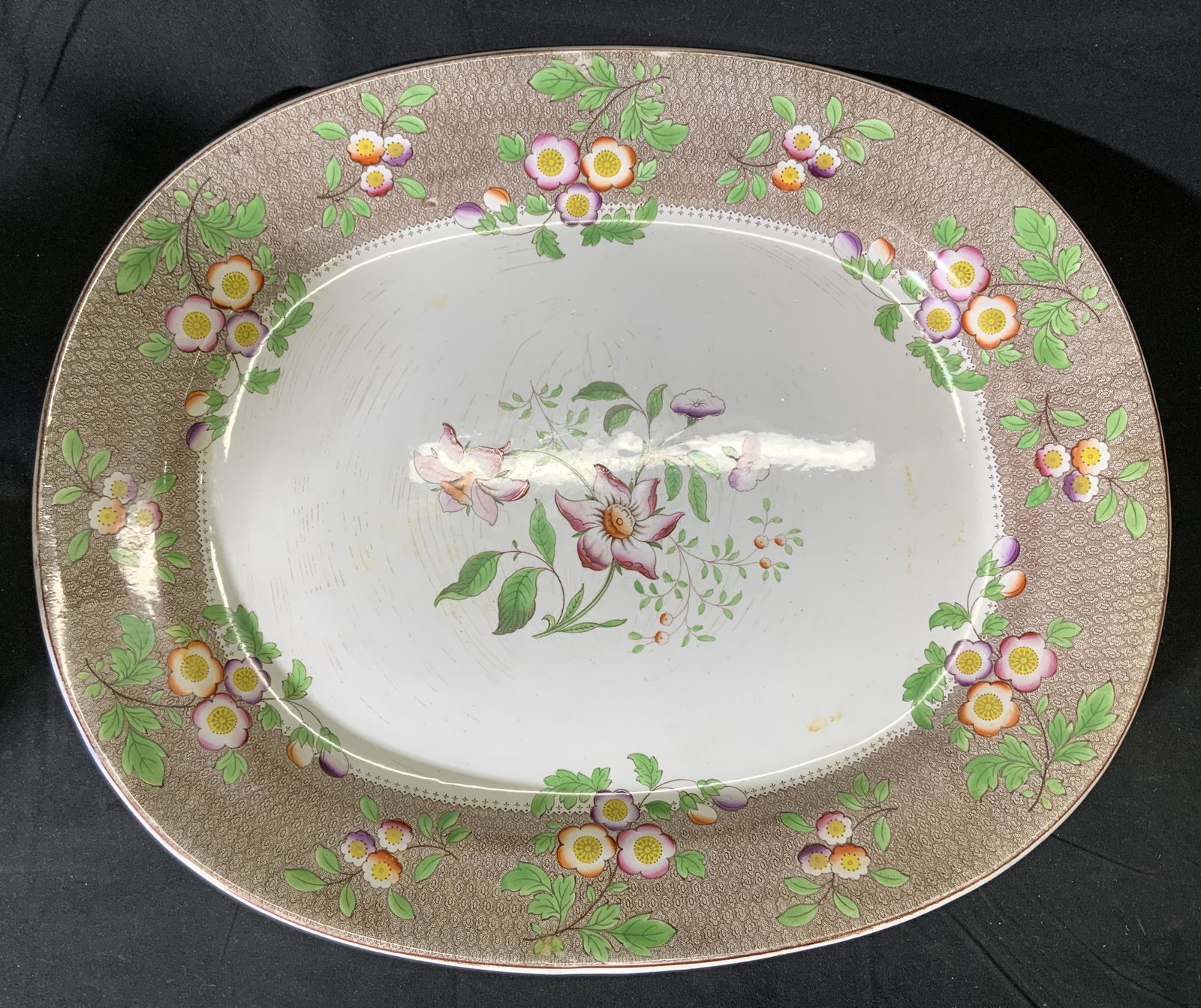 Antique WR & CO China Floral Serving Platter: Antique William Ridgeway & Co bine china serving platter with floral motif in hues of beige, white, pink, and green. Measures approx. 18.75 x 15.25 inches. Surface wear consistent with age and exposur