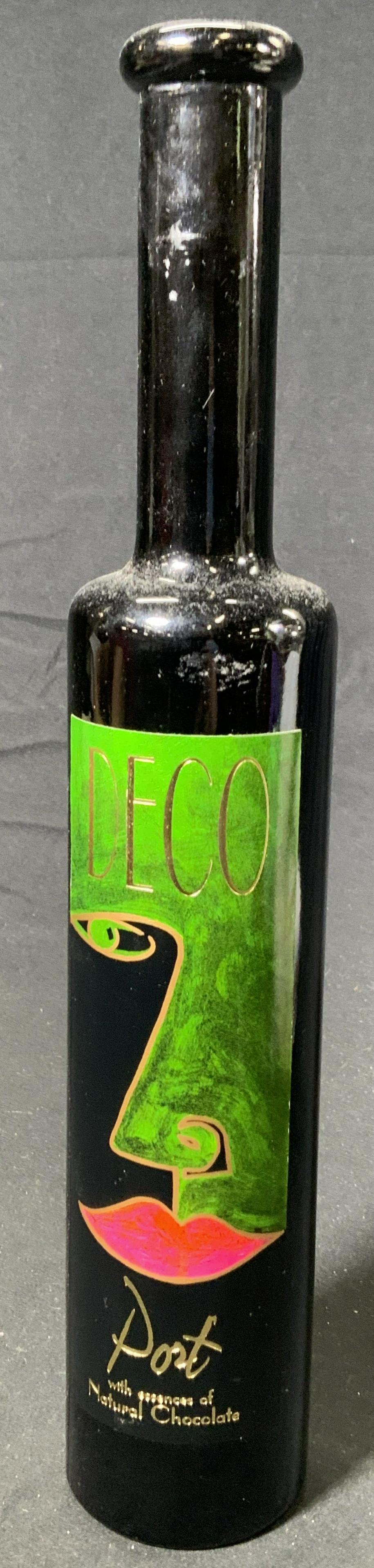 DECO PORT Natural Chocolate Essence Port: An unopened bottle of DECO PORT. Blend of 75% American port and 25% Australian port. Vintage unknown. Vented and bottled by Sonoma Valley Portworks. 500 mls, 18.5% abv. Property of Palm Beach, Fl Esta