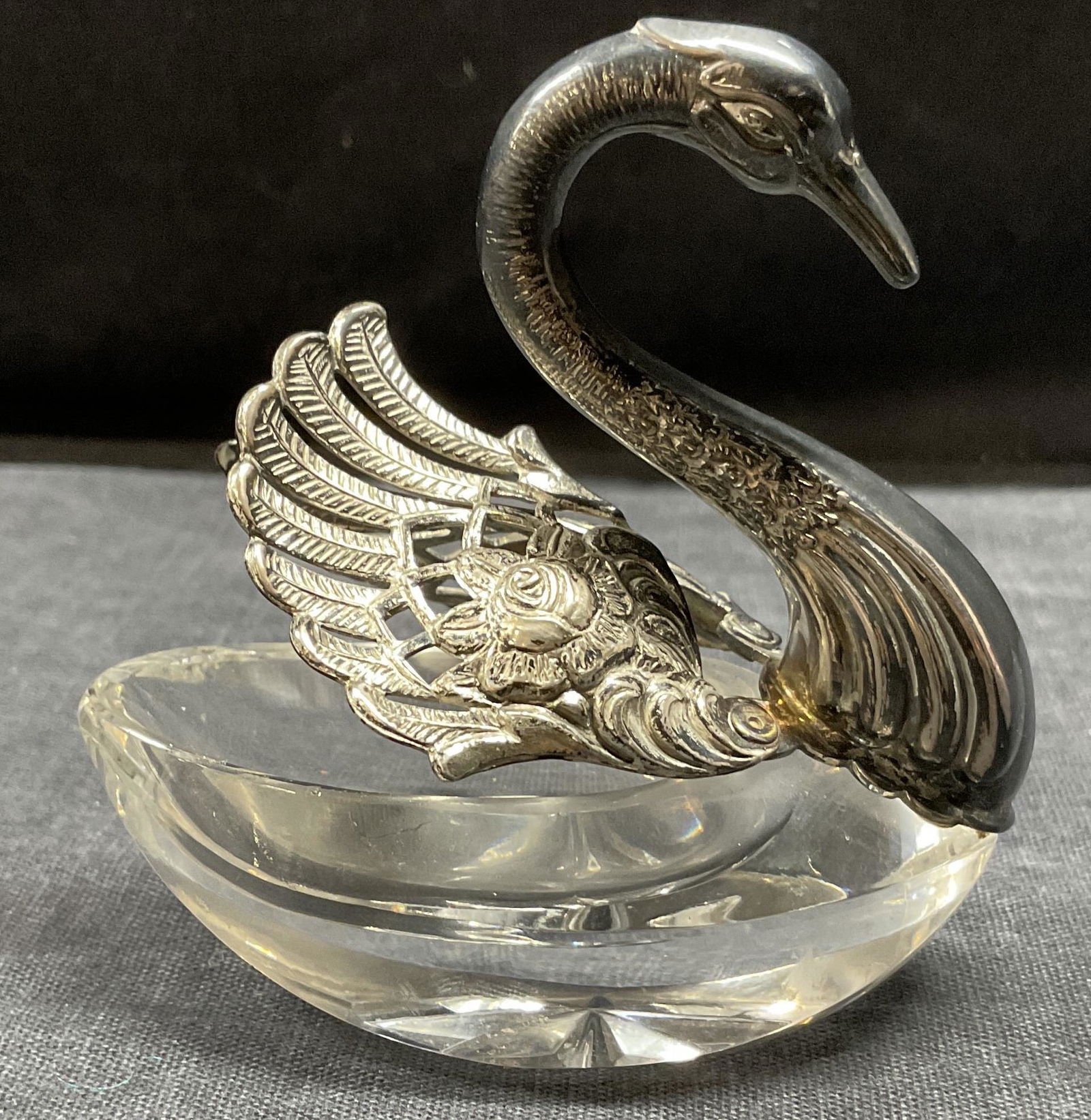 Cut Crystal Swan Salt Cellar: Cut Crystal Swan Salt Cellar with movable wings, no apparent inscriptions or markings, measures 2 3/4 inches tall x 2 3/4 inches wide, surface wear to piece, tarnishing to metal, Property of Palm Beac
