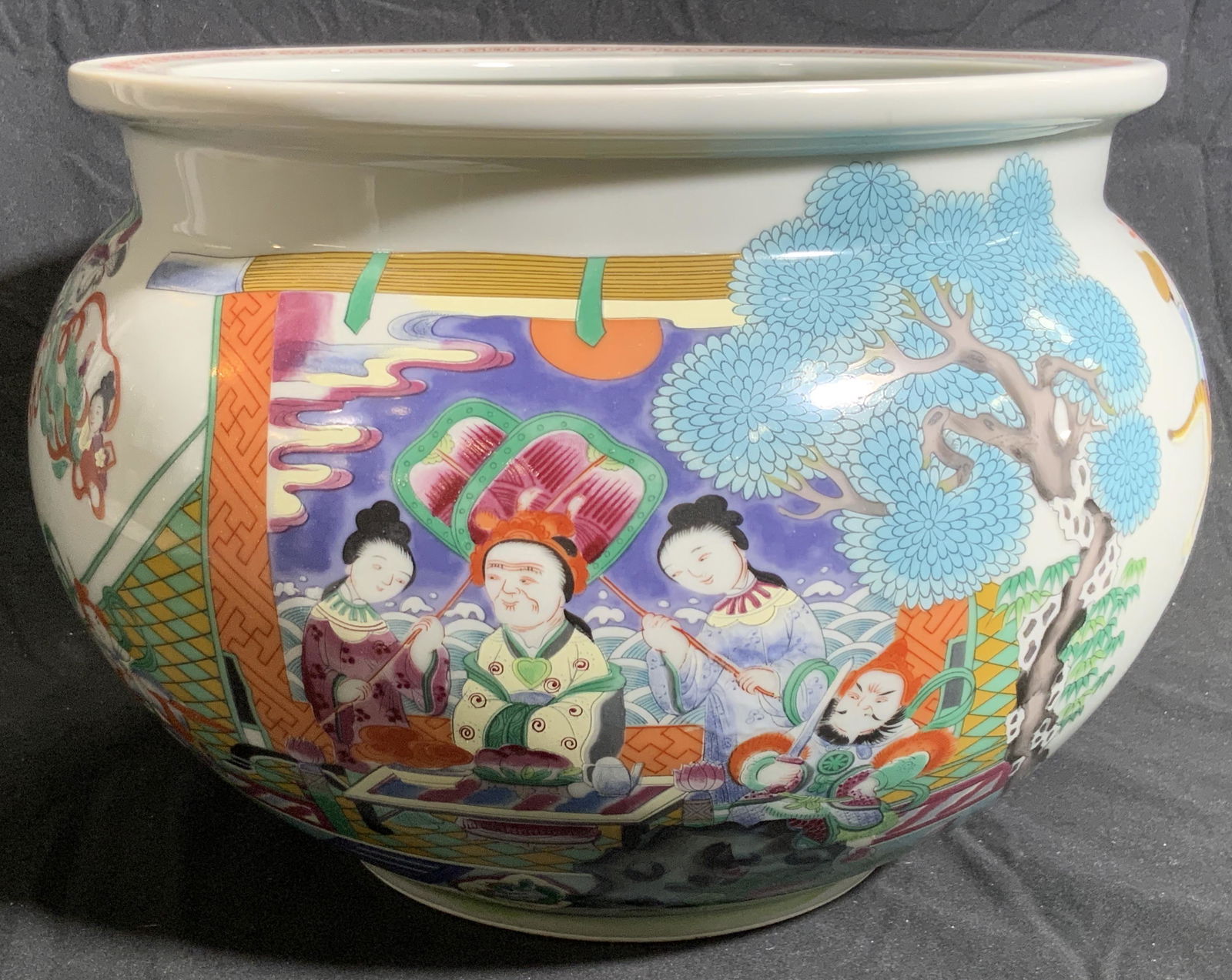 Vntg Fu Dog & Tiger Asian Porcelain Planter Vessel: A vintage glazed Asian porcelain planter vessel. Some hand painted accents. Glaze has a light celadon hue. Hand painted designs depict people in nature settings with animals such as tigers, bulls, cra