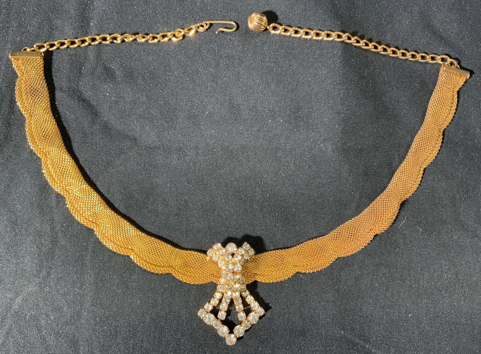 Vintage Gold Tone Mesh Choker Necklace: Vintage gold tone mesh choker necklace with prong set colorless faceted crystals. S hook clasp. Measures approx. 18.5 inches long. In good condition. Property of Palm Beach, Florida estate. Vintage je