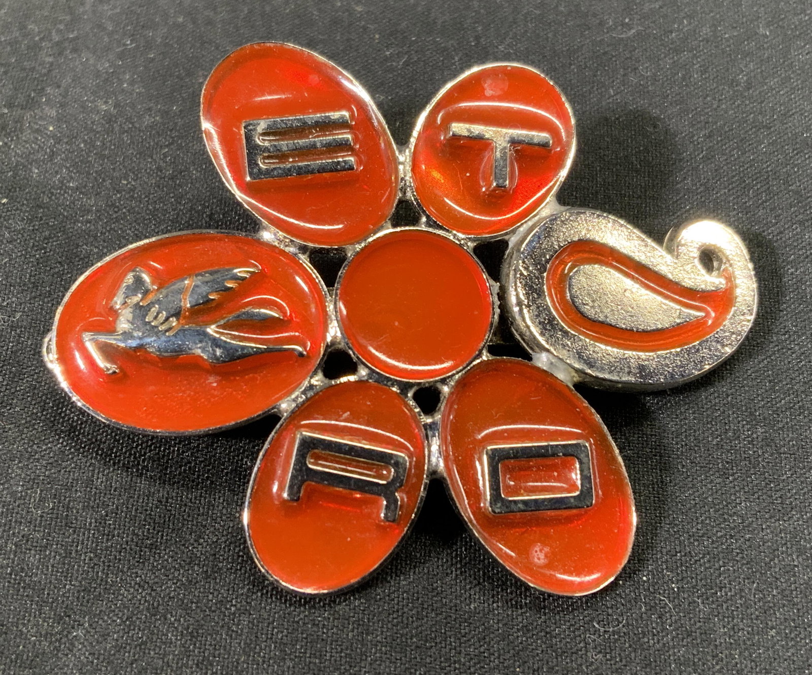 ETRO Enameled Logo Barrette, Hair Accessory ITALY: ETRO enameled orange tone logo barrette. Some surface wear consistent with exposure. Trademarked to underside. Measures approx. 2 x 1.5 inches. Made in Italy. ETRO, ETRO accessories, ladies hair acces