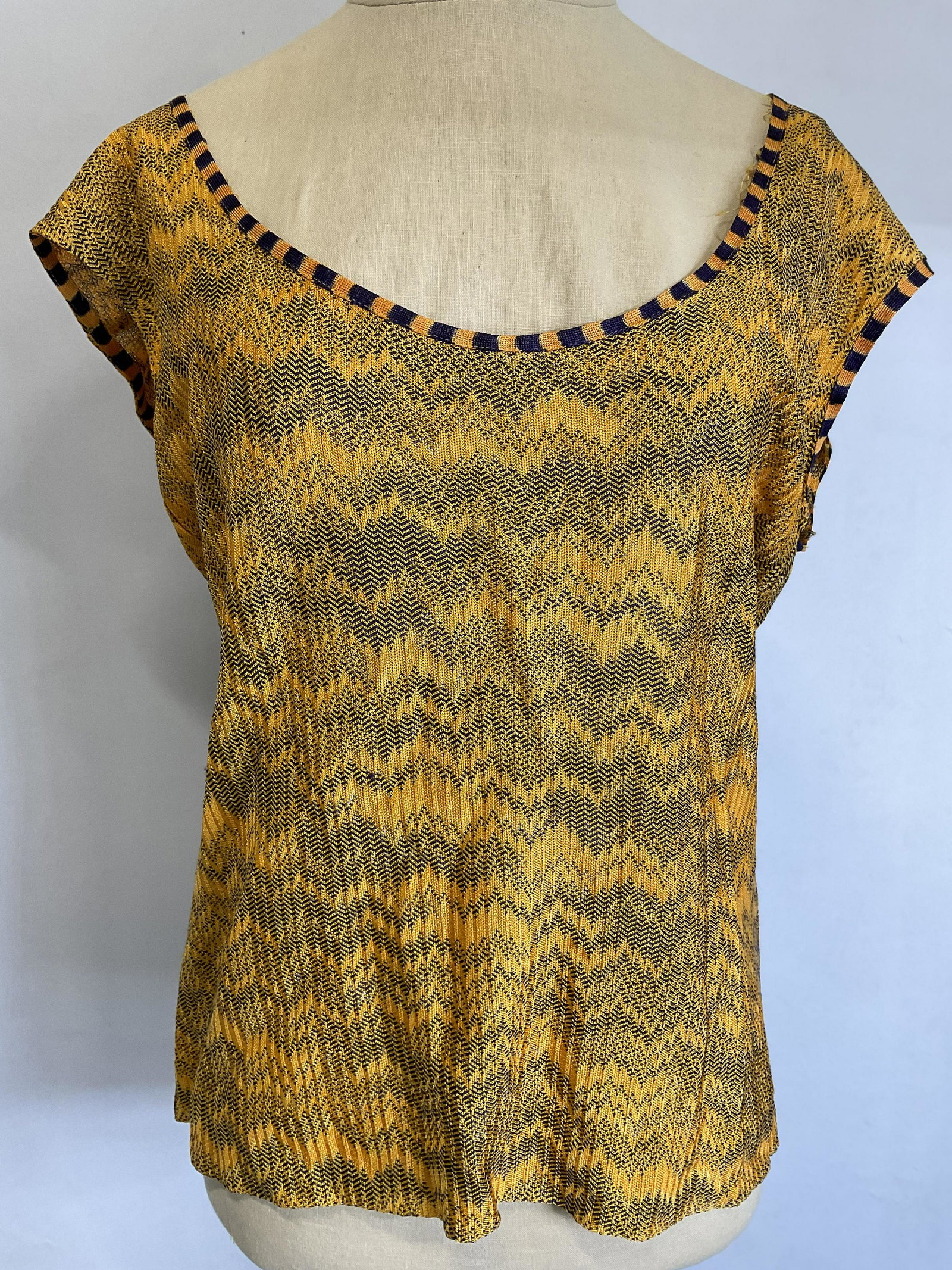 MISSONI Sleeveless Yellow Top, Italy: MISSONI Sleeveless Yellow Top. Made in italy. Material tag reads 100% Rayon, size tag reads 46. Chest measures approx. 20 inches, from shoulder to bottom hem measures 23 inches. Minor thread pulling t