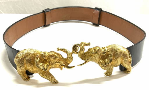 ALEXIS KIRK Gold Plated Elephant Belt buckle, More: Vintage circa 1980s Alexis Kirk signed gold plated elephant figural belt buckle and black leather Saks Fifth Avenue Belt. Belt buckle has 2 pieces and measures approx. 4 x 2 inches each. Buckle is wei