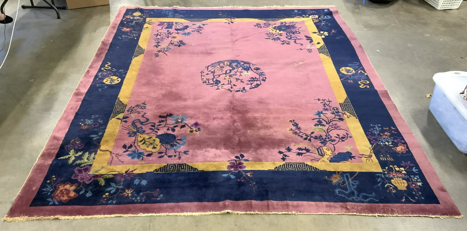 Vintage Handmade Wool Pile Chinese Art Deco Rug: Rug is handmade and wool. Piece is vintage possibly antique. Rug has intricate multi toned floral, vine, leaf & geometric detail. Rug has short fringes at edges. 113 in length by 94 in wide. Rug, carp