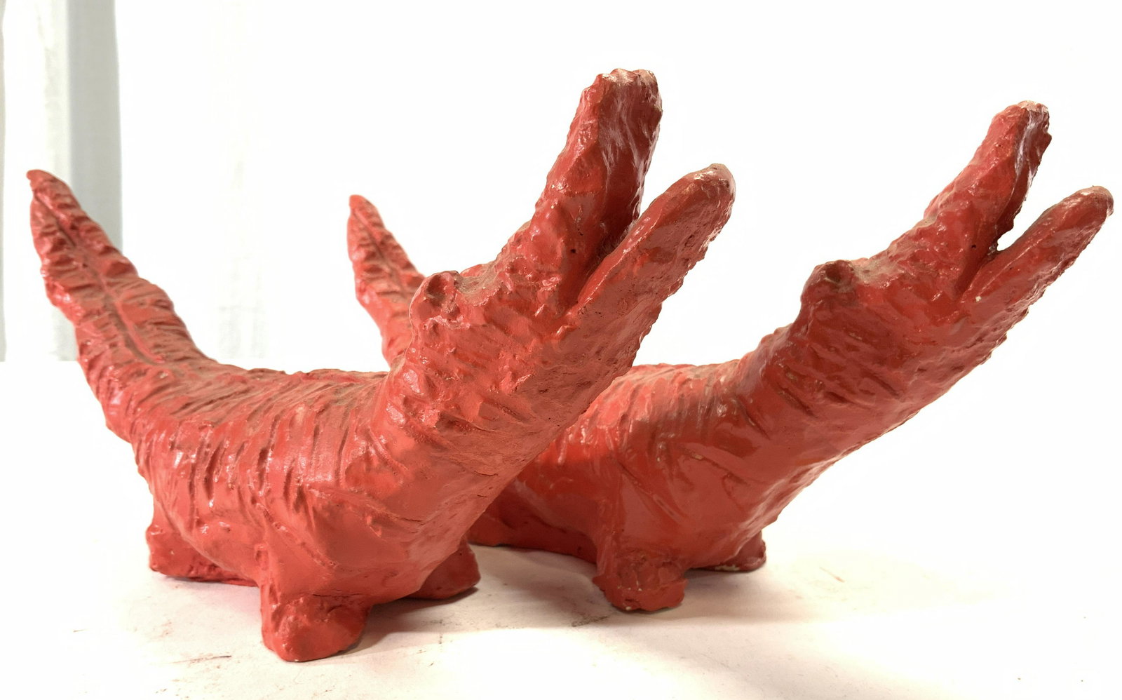 J&J STURM Pair Plaster Crocodile Figurals In Red: Crocodile figures are signed J&J STURM dated 1963. Each crocodile figure is red toned and appears to be plaster. Each piece measures the 12 inches long 5 inches tall 3 inches wide. J and j sturm, j an