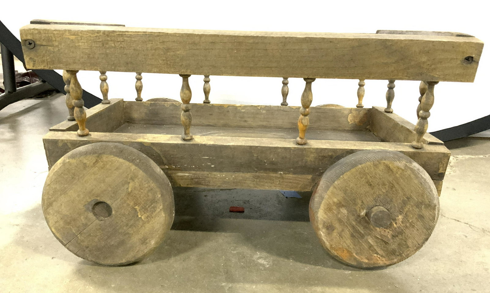 Antique Wooden Wagon Figure: Wagon figure is antique and wooden. Piece appears to possibly be hand crafted. Wagon has wheels. Piece measures approx 16.5 inches long 12 inches deep 10 inches tall. Wagon, wooden wagon, wagon figure