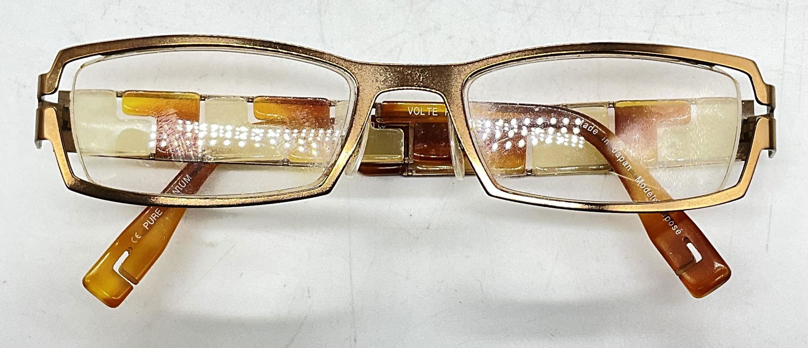 Volte Face Eye Glasses, Japan: Volte Face Eye Glasses. Eye glasses labeled, ‘Volte Face, Made in Japan, Pure Titanium. Lens measures 1.75, ear piece measures 5 inches. Up cycle to prescription eye glasses, or sunglasses. Eye wear