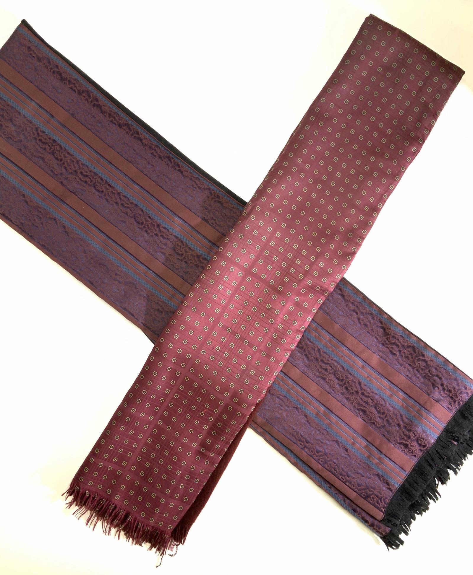 Pair Formal Silk Dress Scarves: Silk burgundy dressy scarf with square print pattern, other side also burgundy, feels like cashmere, 9 x 50 in. Textured fabric scarf, possibly silk on one side, burgundy and blue with stripe pattern,