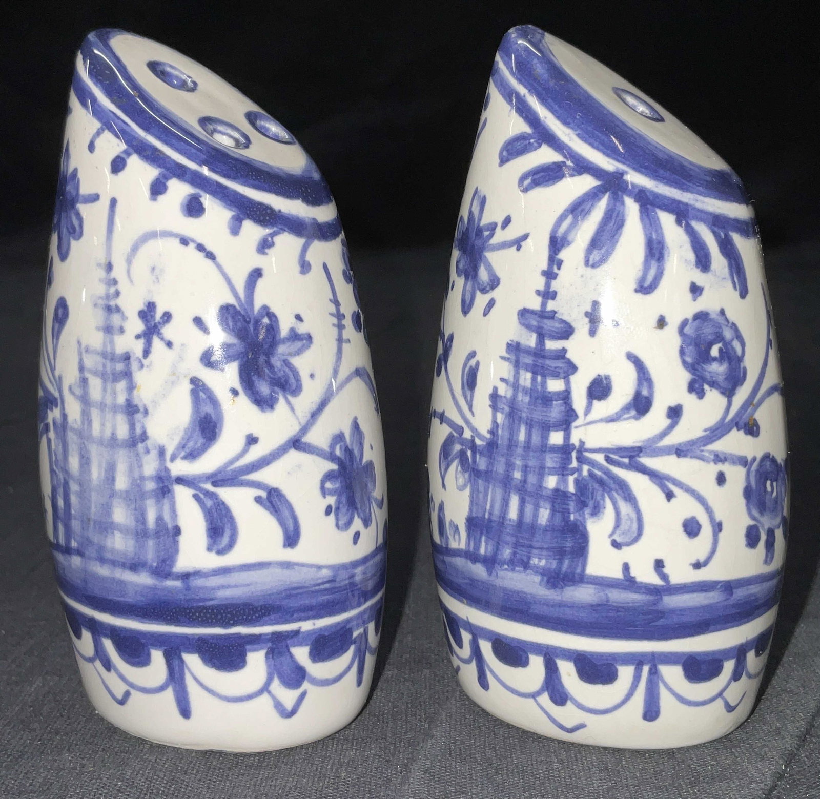 Vintage Ceramic Delft Style Salt & Pepper Shaker: Vintage Ceramic Delft Style Salt & Pepper Shaker. Needs stopper to bottom. Measures approx 3.5H x 2 W inches. Bottoms labeled Filler A.9 24. Surface wear to piece consistent with age and use. Salt & p