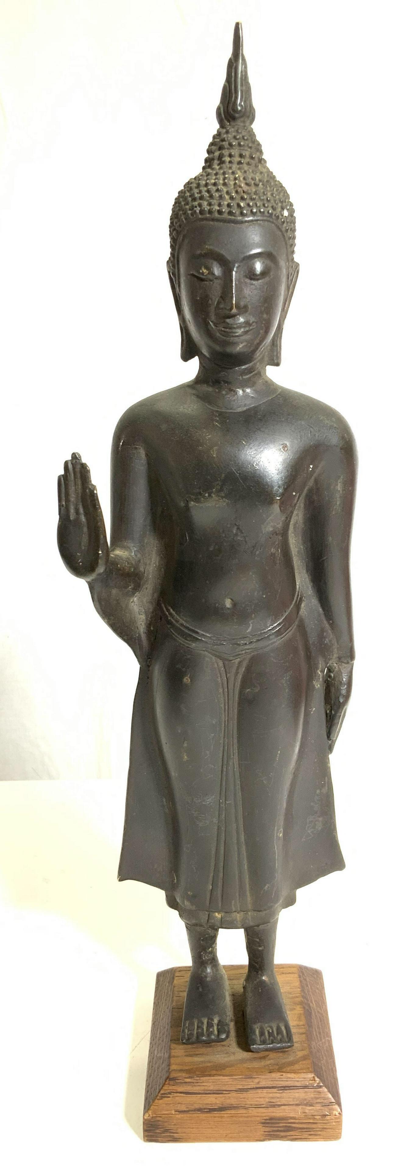 Weighted Bronze Coated Standing Buddha Statuette: Metal standing Buddha figure on wood stand, coated with bronze over base metal. 13.5 in ht., 4 in wide, 2. 75 in deep. 3 Buddhist bodhisattva, Bronze Toned Metal Buddha statuette, Tibetan decor, Nepal