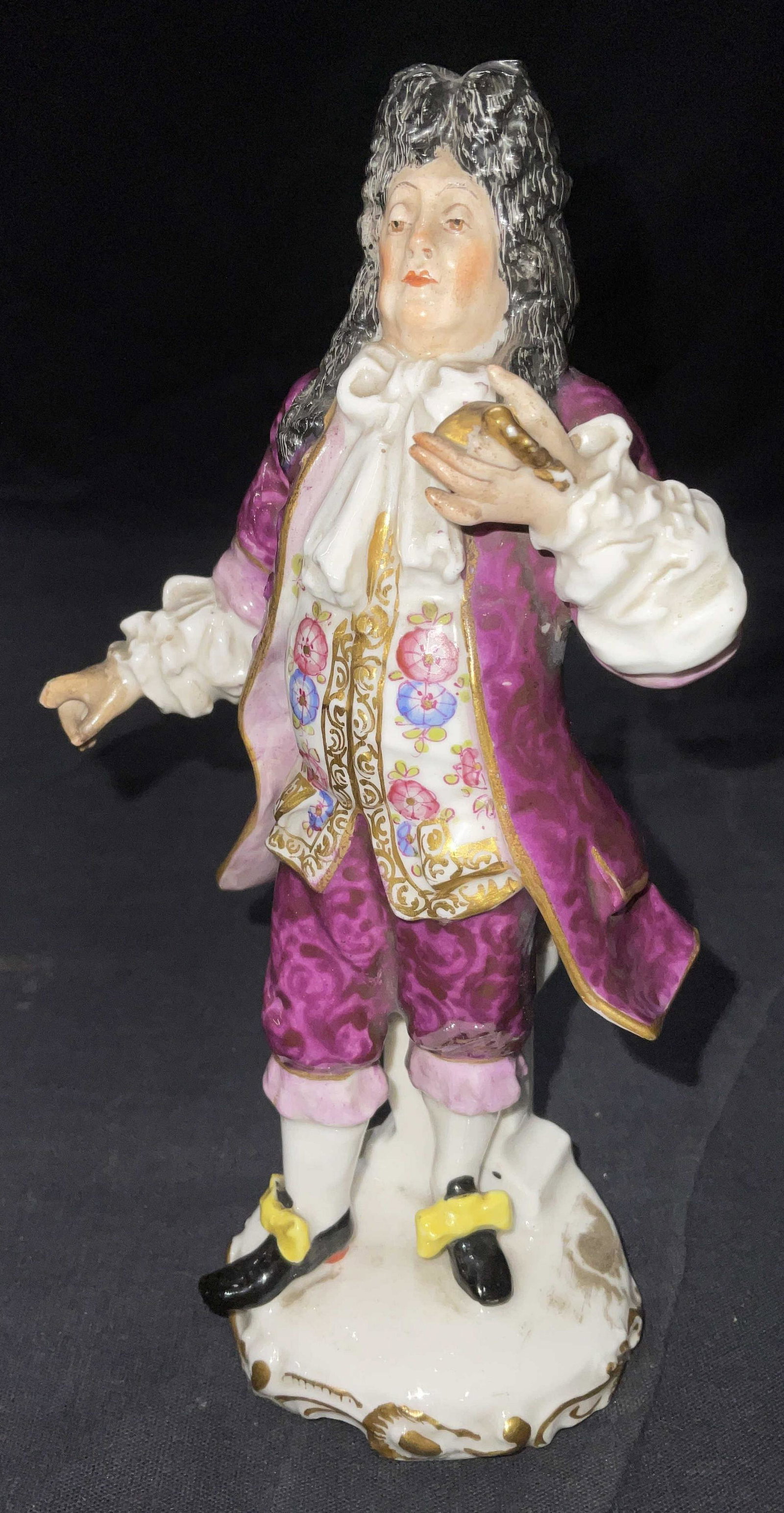 Meissen Porcelain Figural of Monsieur Purgon,: This figurine of Monsieur Purgon, Argan's doctor in Molière's play Le Malade Imaginaire. Bottom underglazed hallmark of Meissen 2 interlocking swords. Piece has some damage. Missing 1 finger off each