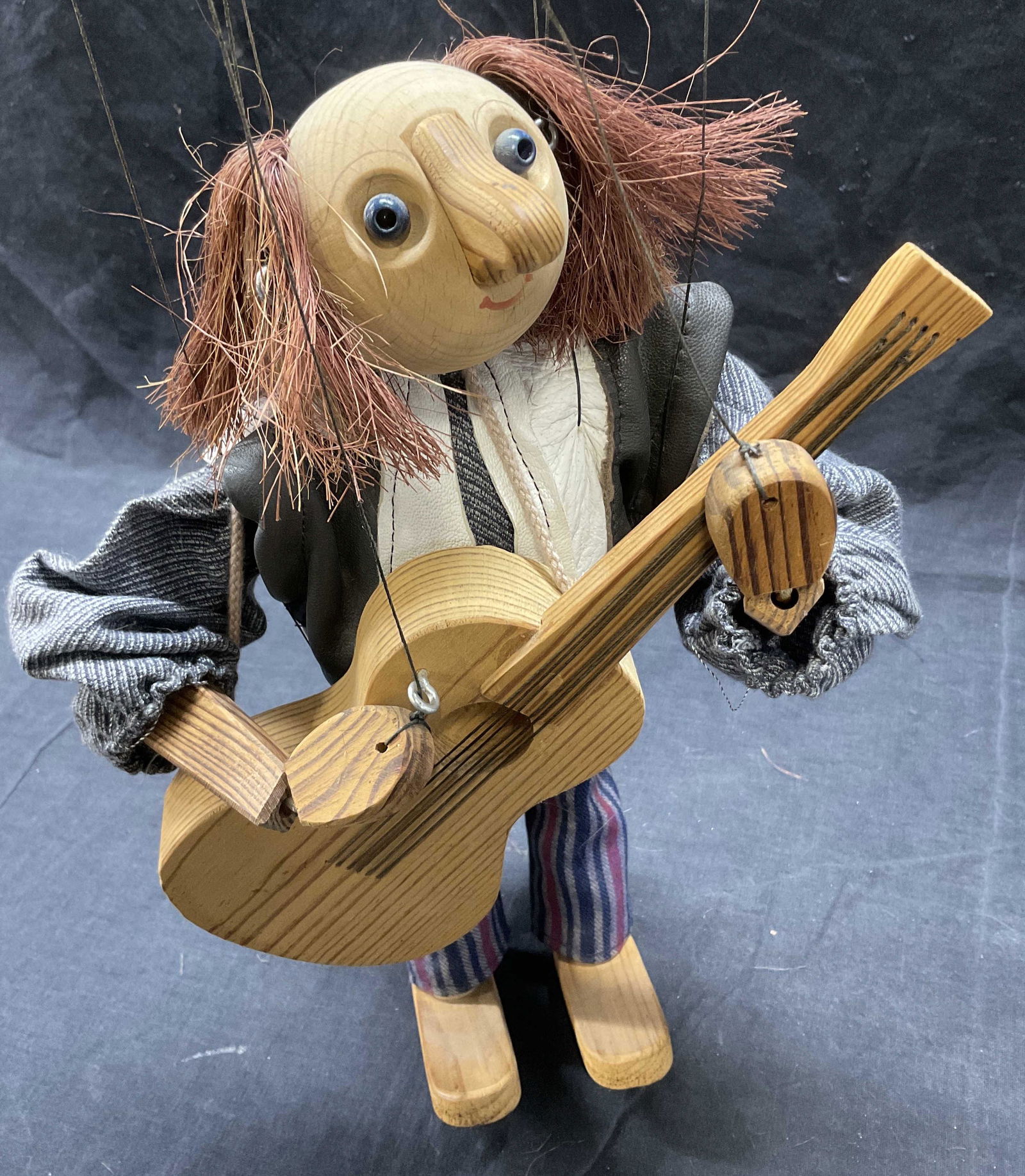 Wooden Puppet Playing Guitar (1 of 5)