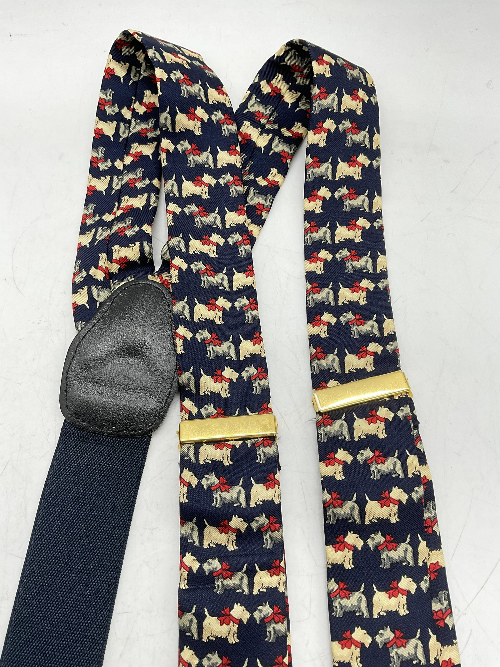 Silk Scottish Terrier Motif Suspenders: Silk Scottish Terrier Motif Suspenders. No material label or name label to piece, soft hand feel, possibly silk. Minimal wear to piece. Adjustable straps. Suspenders, mens wear, mens suspenders, cloth