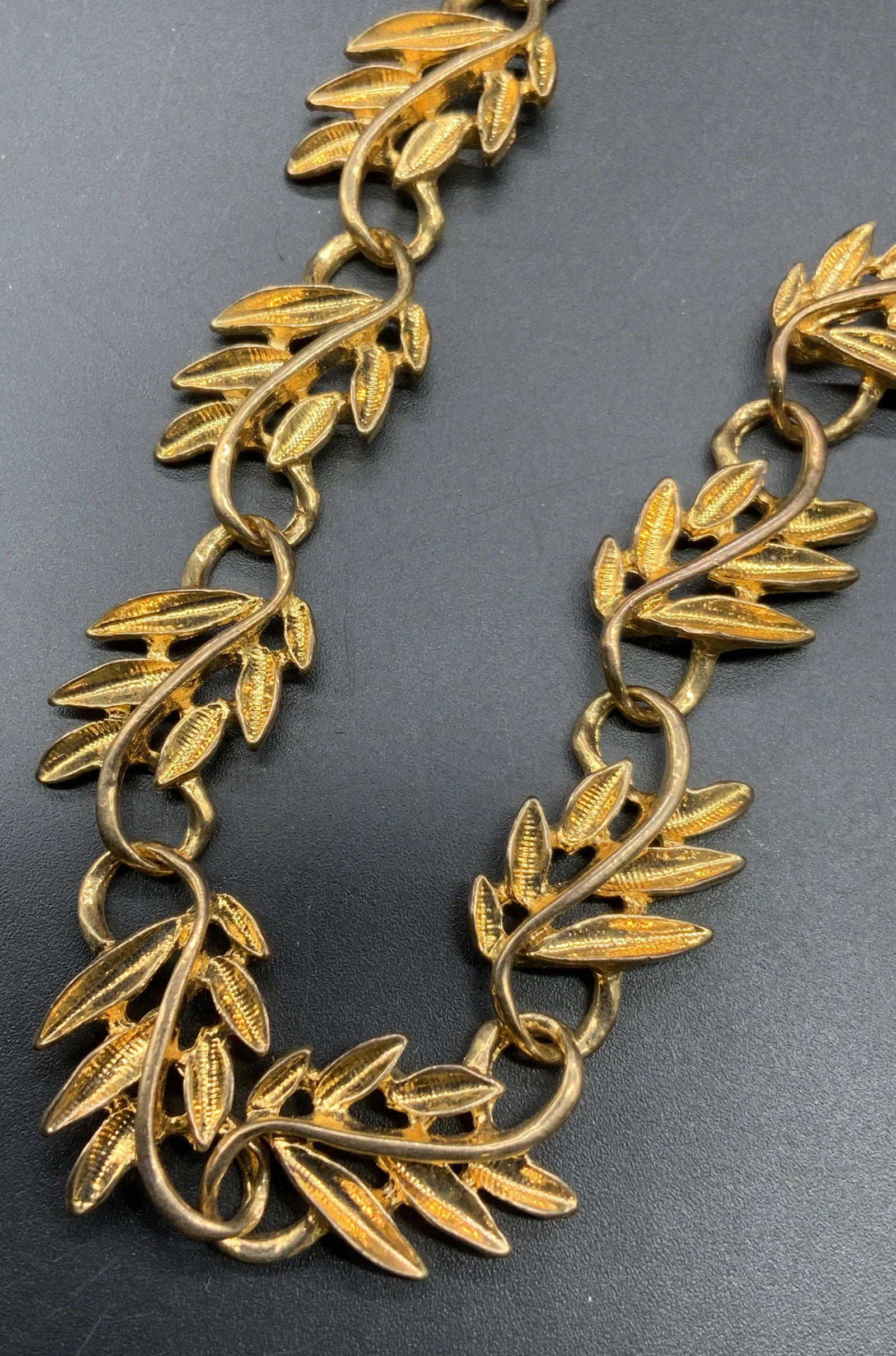 Vintage Gold Tone Botanical Choker Necklace: Vintage gold tone choker necklace with botanical motif. Box clasp. Measures approx. 15.5 inches long. In good condition. Property of Palm Beach, Florida estate. Vintage jewelry, estate jewelry, costum