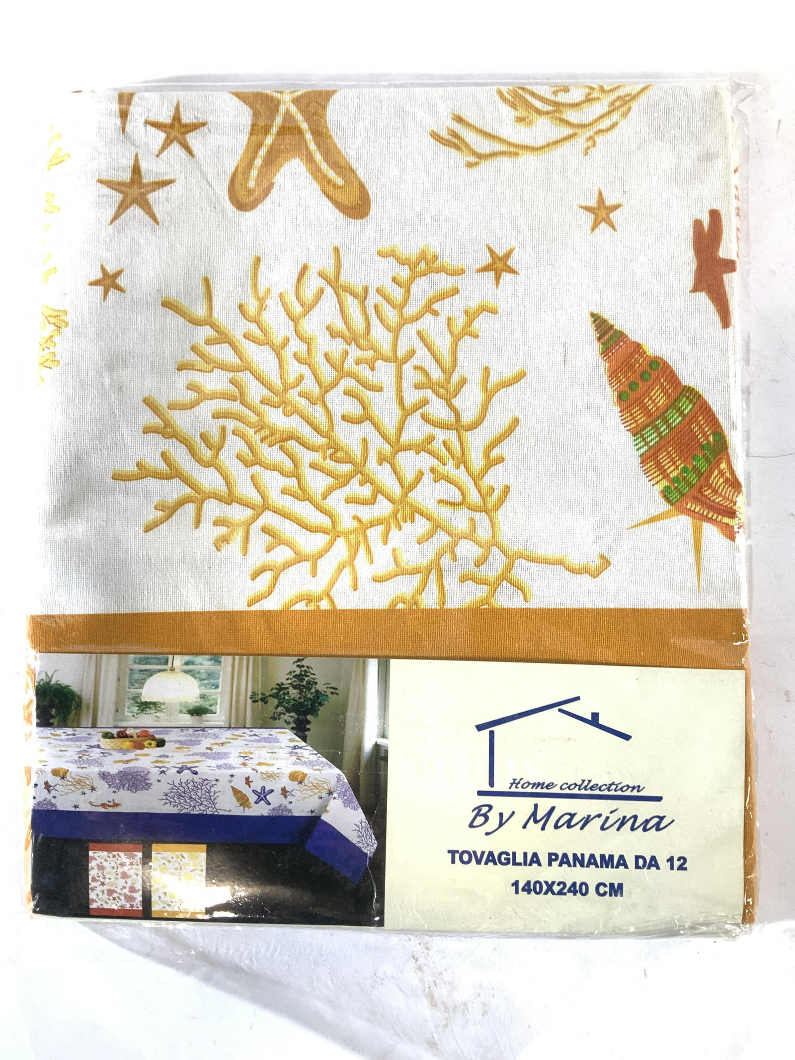 Home Collection by Marina Cotton Tablecloth, NIP: Ocean reef motif tablecloth, new in package ( opened for photography), Orange border with seahorse, coral, starfish and shell design. Measures 55 x 94 in. 3 Made in Italy, Nautical Motif Tablecloth, c