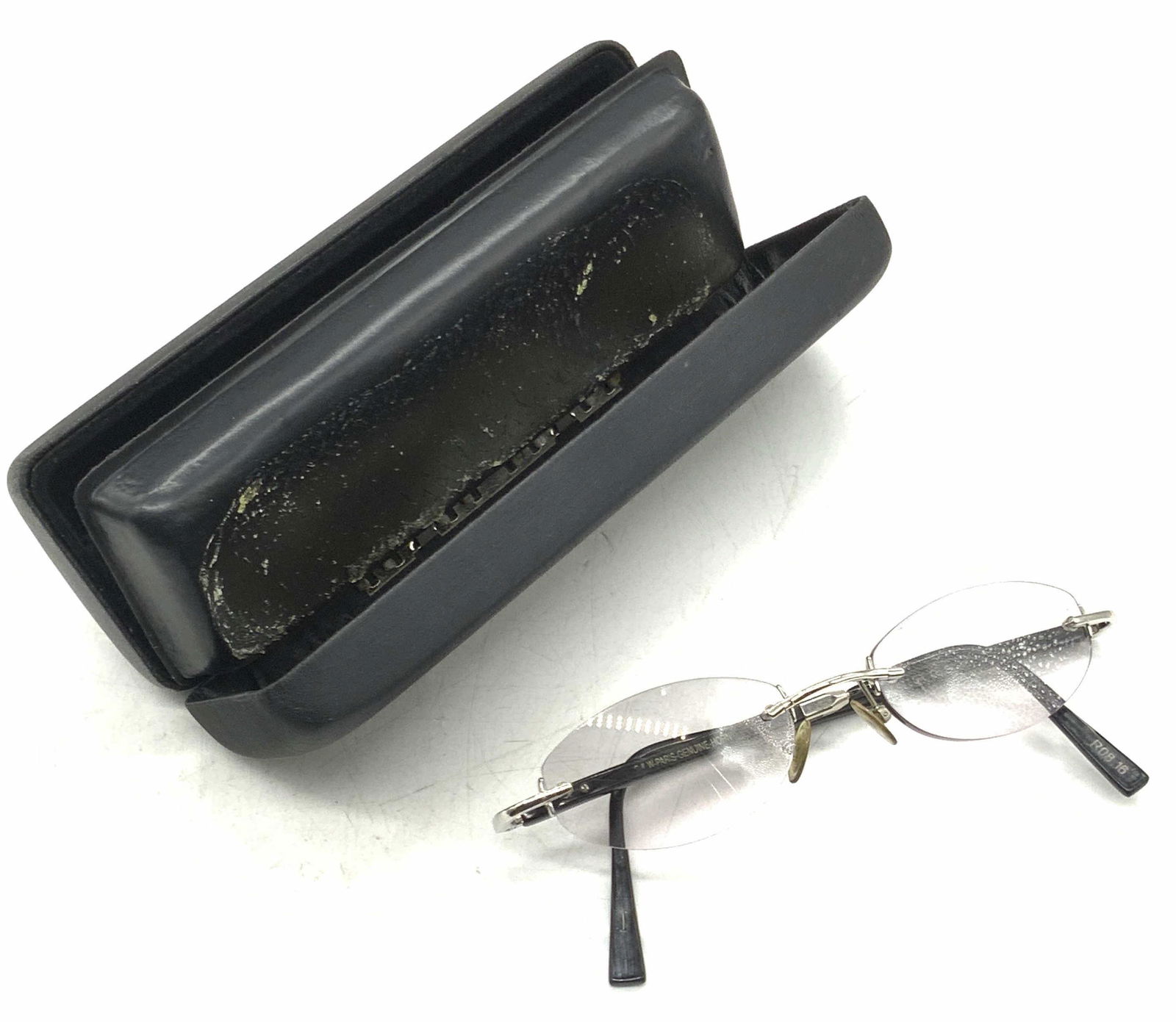 Vintage Genuine Horn Glasses W/ Case, Paris: Vintage Genuine Horn Glasses. Comes with a black case. Glasses measure approx 1L x 5W in. Glasses read GENUINE HORN PARIS, R0816. Other writing illegible. Wear consistent with vintage age and use. Som