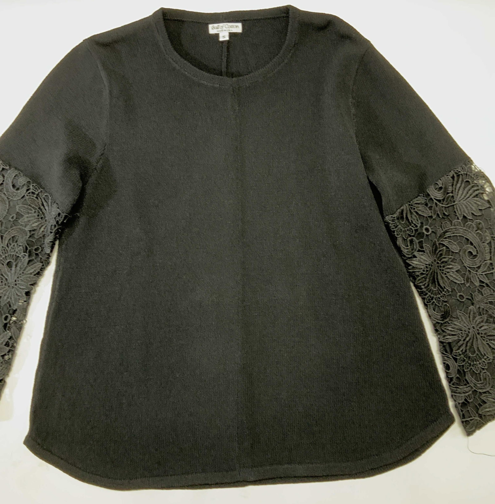 Ball of Cotton Boutique Sweater w Embroideredy: Signed Ball of Cotton black knit sweater, size Small , should fit medium, has a lot of stretch. 85% viscose 15% elastin. Possibly never worn, like new. Sleeves are flared. lower sleeve is a sheer fabr