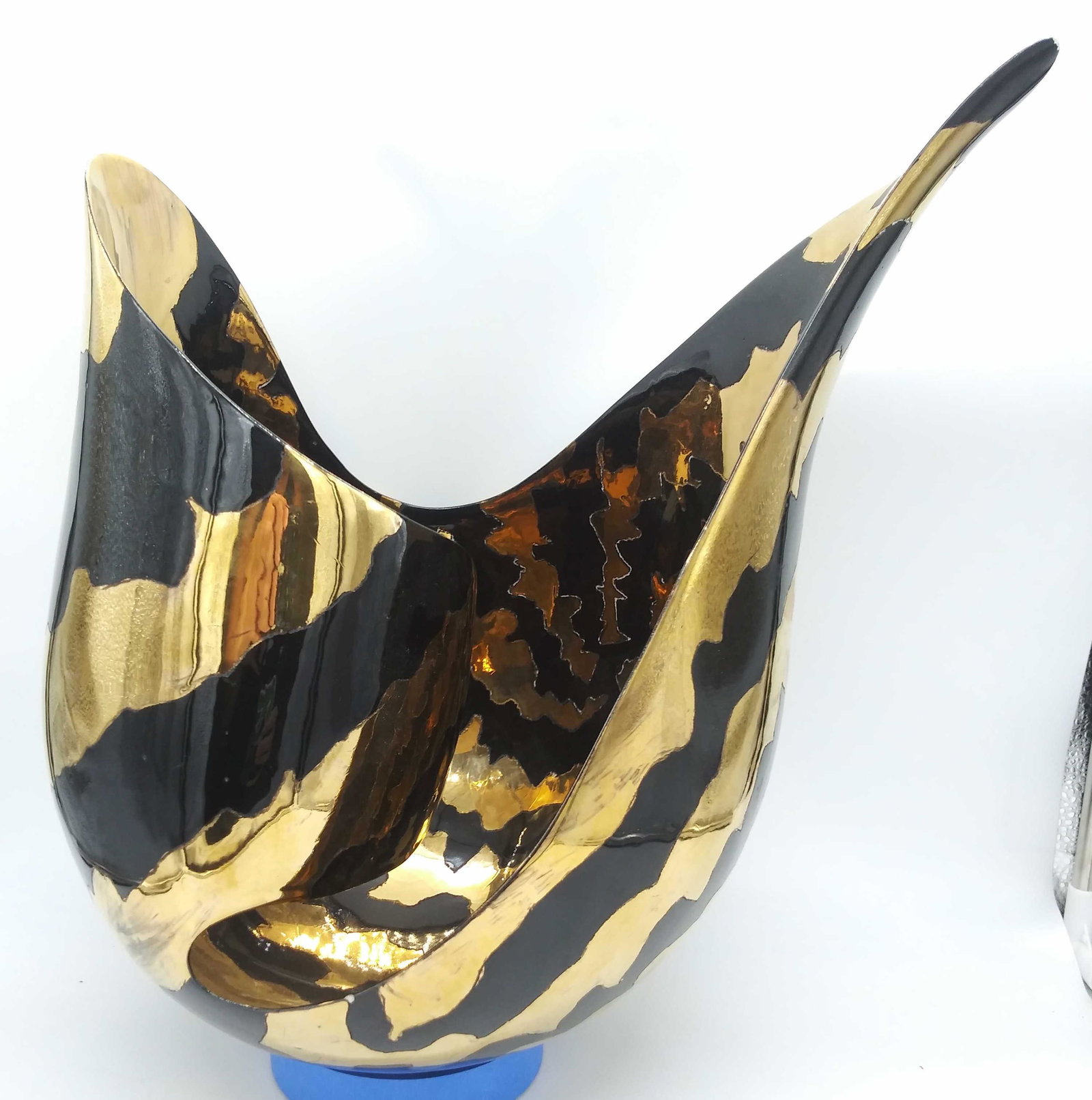 LARRY LUBOW Signd Gilt Ceramic Centerpiece Bowl XL: LARRY LUBOW Signed Gilt Ceramic Bowl, signature to base reads LUBOW 88, a bowl with abstracted bowl with asymmetrical stripes, measures 11 5/8 inches at tallest point, 16 3/4 inches at widest point, s