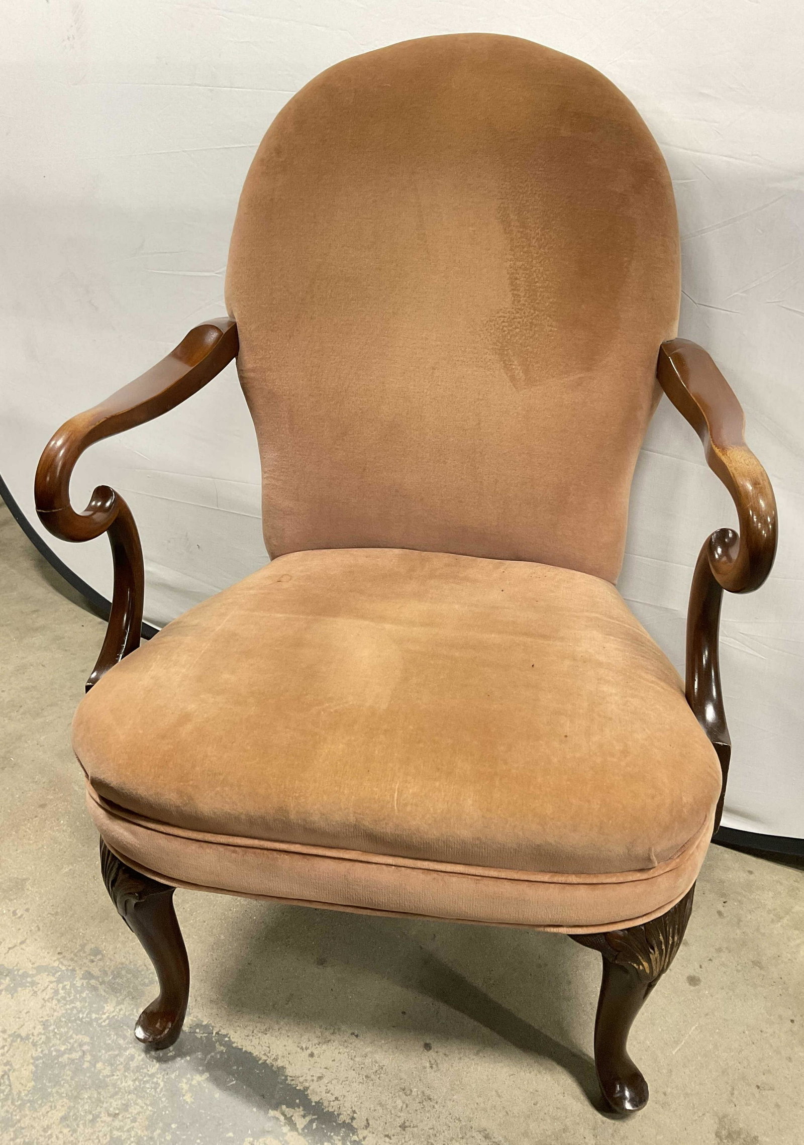 Queen Anne Style Mahogany Frame Armchair Pad Foot: Queen Anne Style Mahogany Frame Armchair Pad Foot. Measures 40W x 27.25W x 21.5 inches. Significant wear to piece. Discoloration to Upholstery. Scuffs to carved wood (see photos). Significant weight t