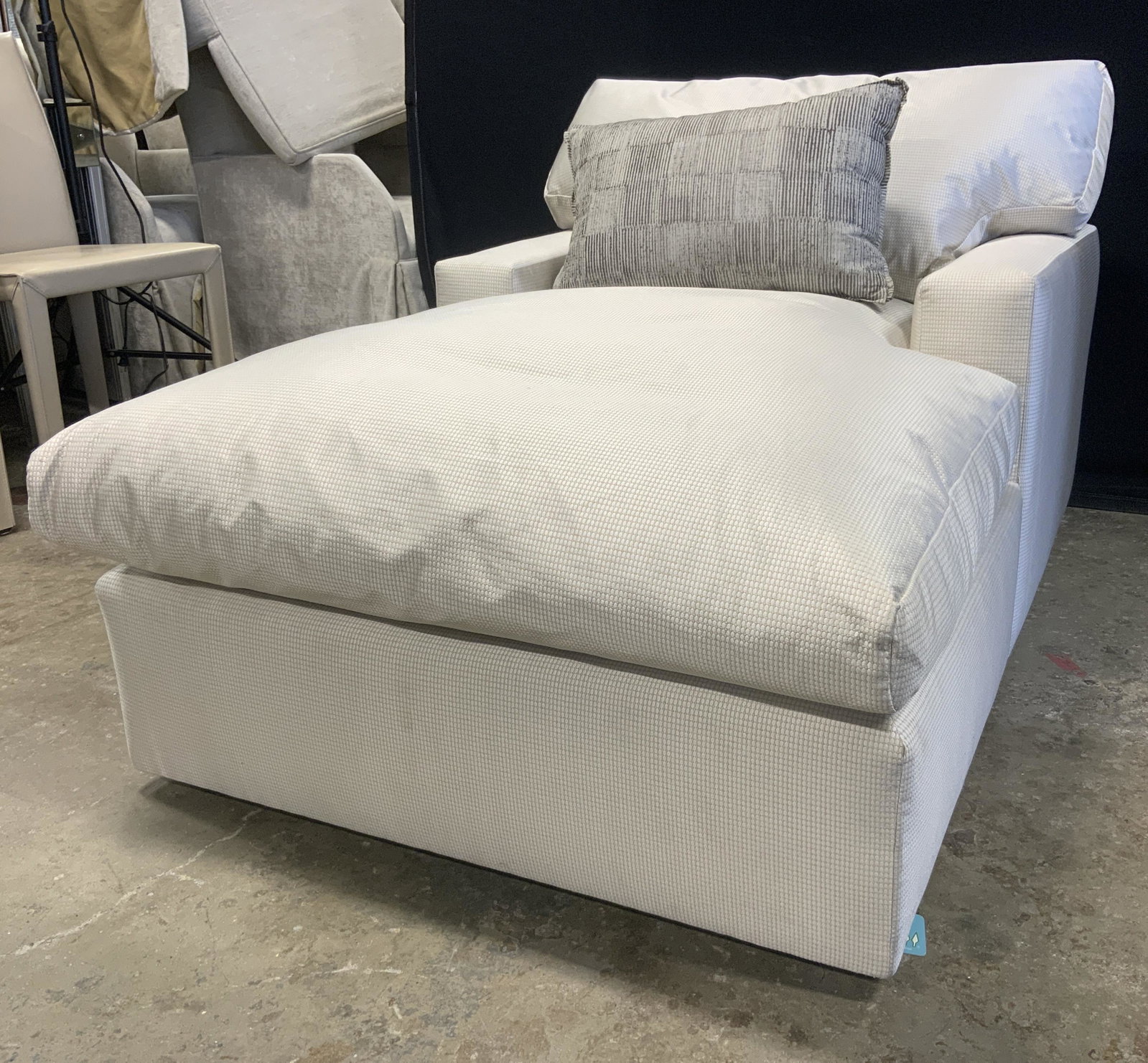 Upholstered Chaise Lounge W Pillow: Lounge is upholstered with light gold toned patterned fabric. Piece includes pillow. Lounge has armrests backrest cushion & seat cushion. General surface wear including loose threads, snags, discolora