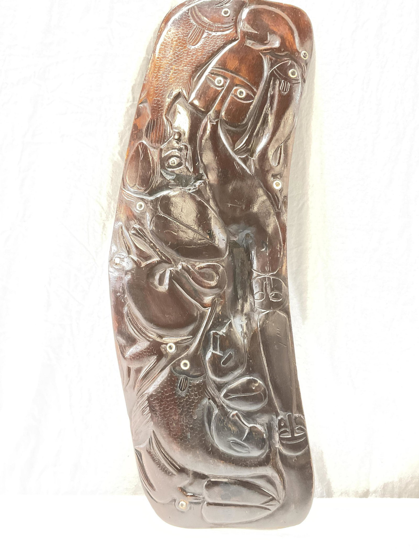 South Pacific Wood Carved Totem W Figurals: South Pacific Wood Carved Totem W Figural's. Measures approx 26.5 x 10 inches. Eyes to figures are possibly inlaid shells. Reverse carved with linguistic type characters. Some natural imperfections to