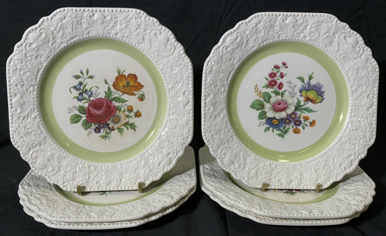 Set 5 CUTHBERTSON Vintage Porcelain Floral Plates: Set of 5 vintage porcelain CUTHBERTSON salad plates with floral motifs. Ornate embossed rims with light green border and floral motifs to center. Measures approx. 8.5 x 8.5 inches each. All pieces tra