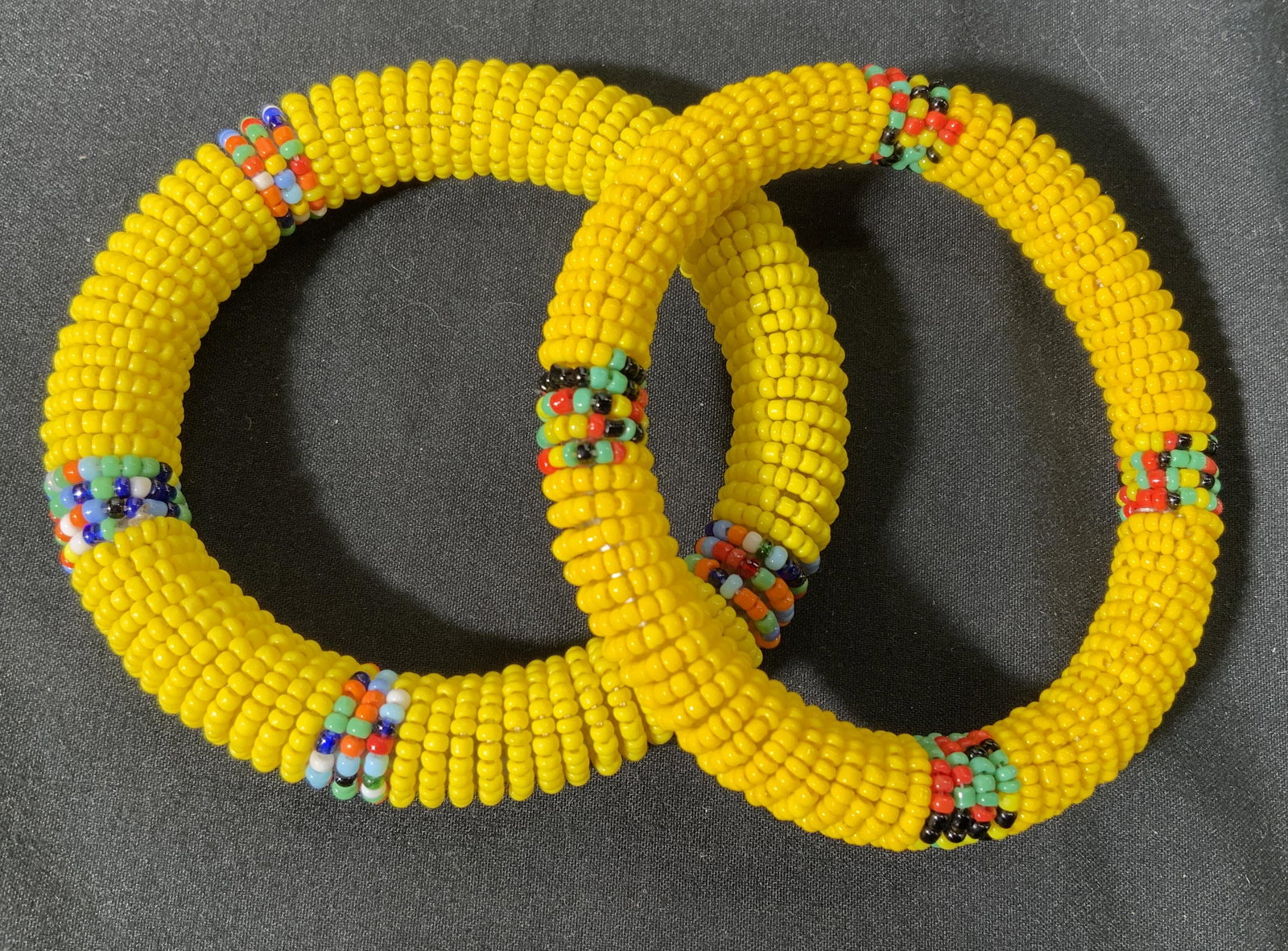 Southwest Style Artisan Beaded Bangle Bracelets: Pair of southwest style artisan beaded bangle bracelets. Measure approx. 2.5 inches wide each. In good condition. Southwest jewelry, Native American style jewelry, artisan jewelry, hand crafted jewelr