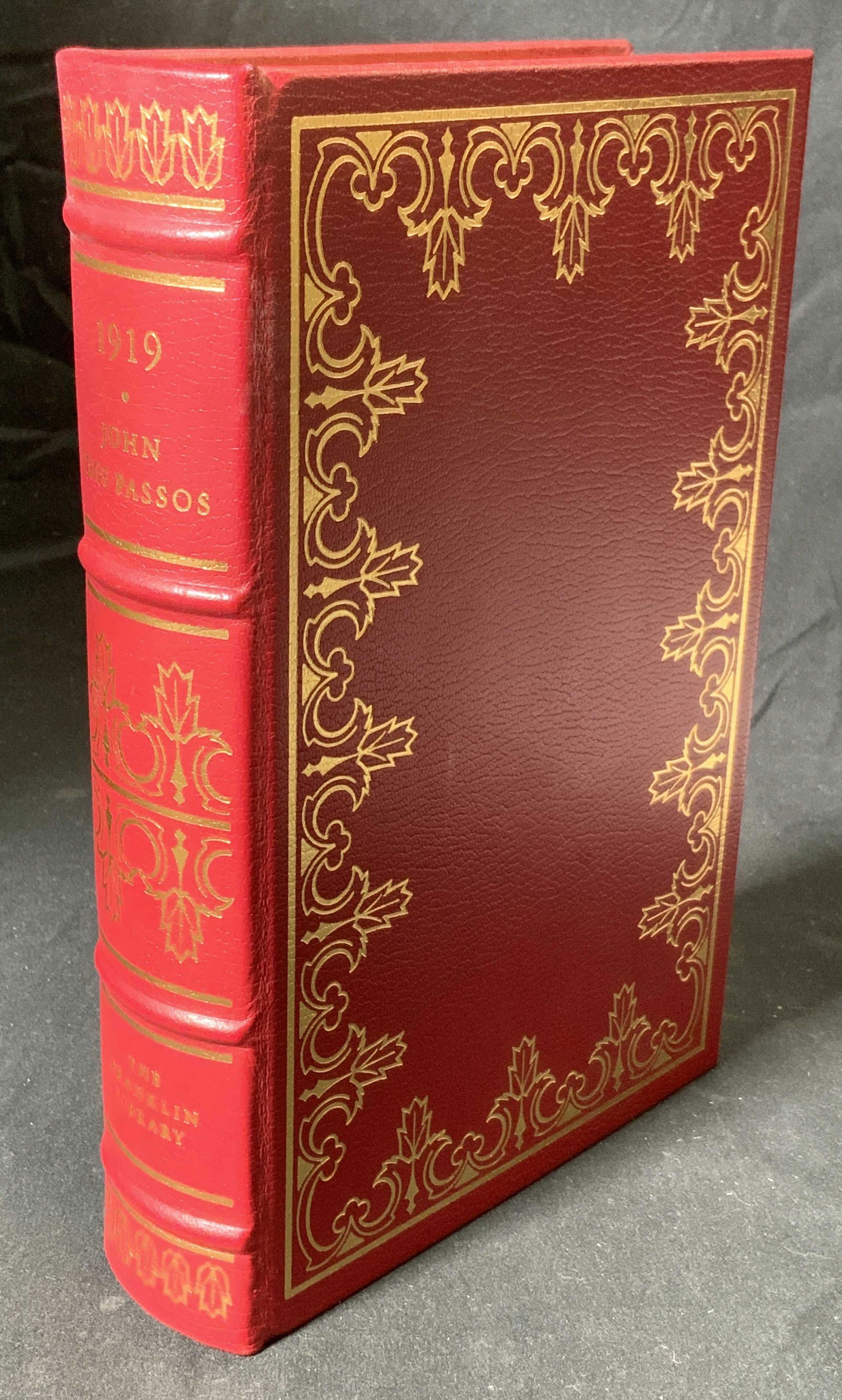 Limited Edition JOHN DOS PASSOS 1919: Limited edition hardbound leather copy of 1919 by John Dos Passos. Illustration by Reginald Marsh. Published by the Franklin Library, 1978. Part of the 100 Greatest Masterpieces of American Literature