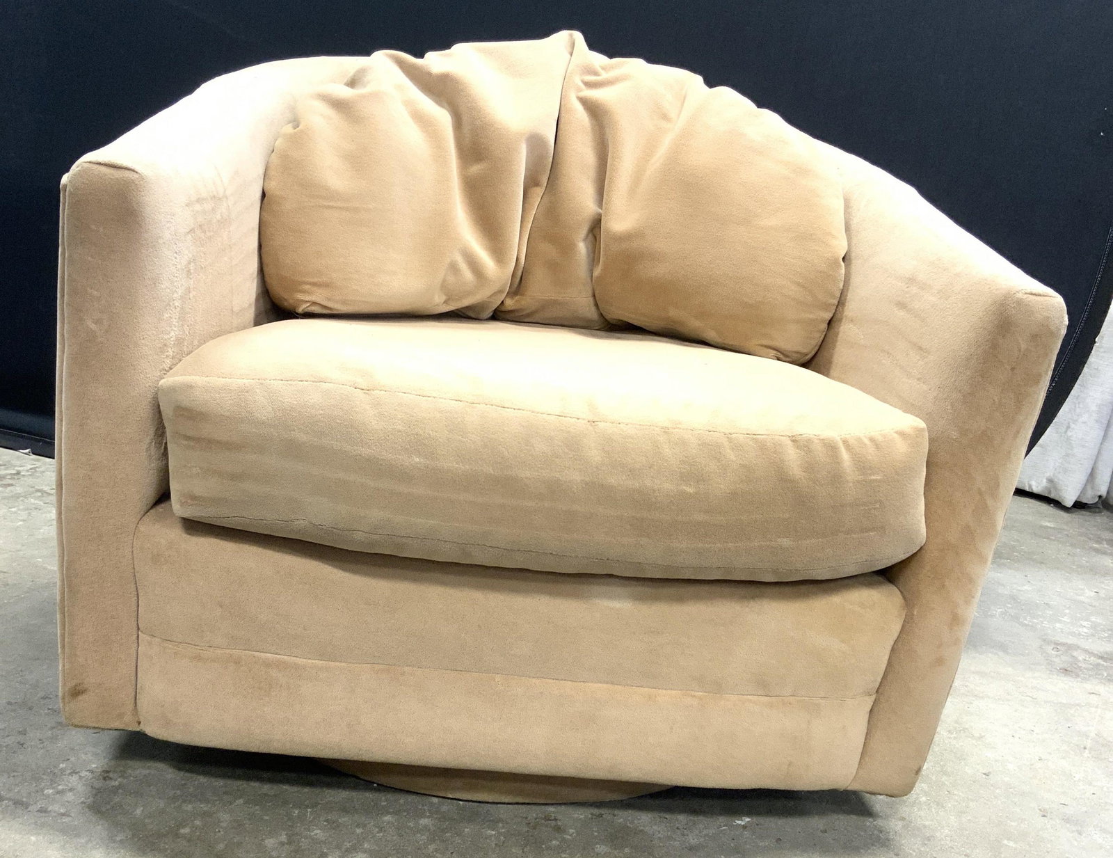 MAURICE VILLENCY Barrel Back Armchair: Underneath cushion has tag which reads MAURICE VILLENCY. Armchair has barrel shaped backrest. Chair swivels. Piece is tan toned. Measures 32 inches deep 26 inches tall 31 inches wide. Armchair, MAURIC