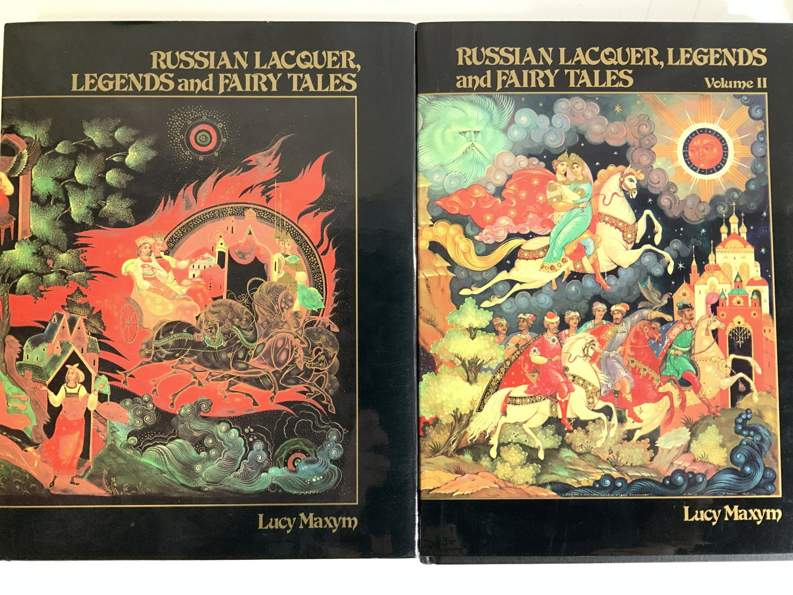 Russian Lacquer & Fairy Tales Books: Russian Lacquer, Legends & Fairy Tales By Lucy Maxym. 2 of each book, original and Vol 2. C. 1990 Siamese Imports Co, Inc. Measure 11.5x9x 1/2 in. Colorful photography and history of Russian Lacquerwa