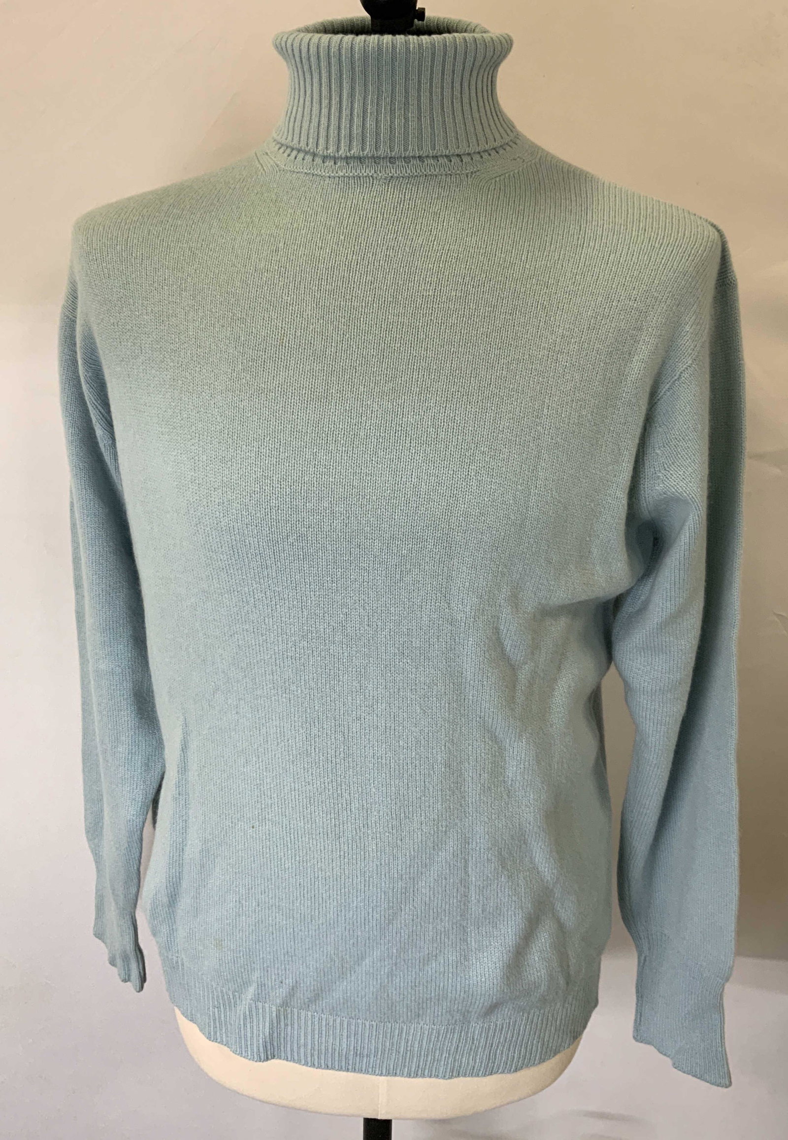 Unlabeled Designer Light Blue Turtleneck Sweater: Unlabeled designer light blue turtleneck sweater. Marked size 44. No other labels or tags present. Material feels like cashmere. some blemishes present. Menswear, mens sweater, mens blue sweater, mens
