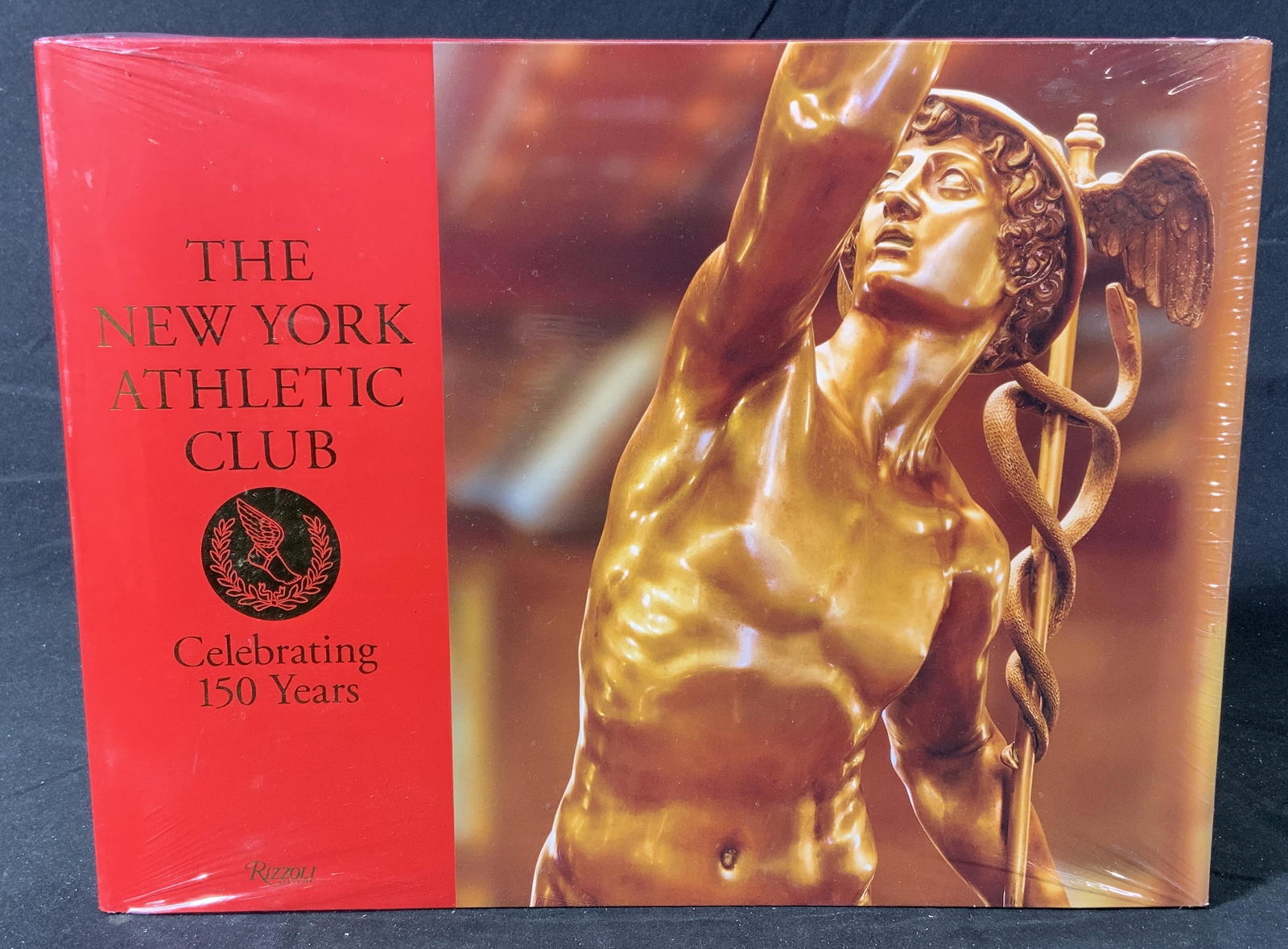 The New York Athletic Club 150th Anniversary NIP: Hardcover copy of The New York Athletic Club Celebrating 150 Years book. Text by nick Voulgaris. New in packaging. Published by Rizzoli, 2017. Measures approx. 12.25 x 9.25 inches. The New York athlet
