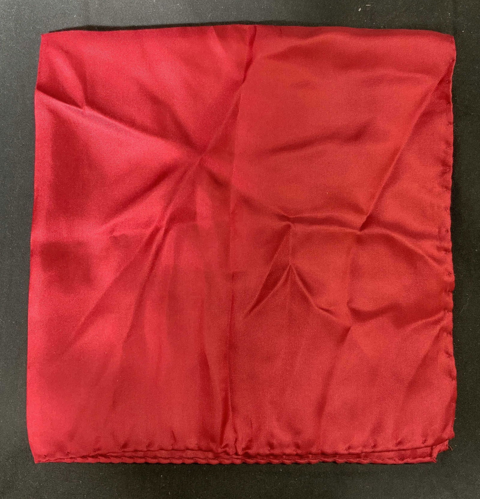 Red Silk Pocket Square, Italy: Red silk pocket square. Made in Italy. Some wear to material consistent with exposure. Measures approx. 16.5 x 17 inches. Pocket square, silk pocket square, red pocket square, mens accessories, mens w